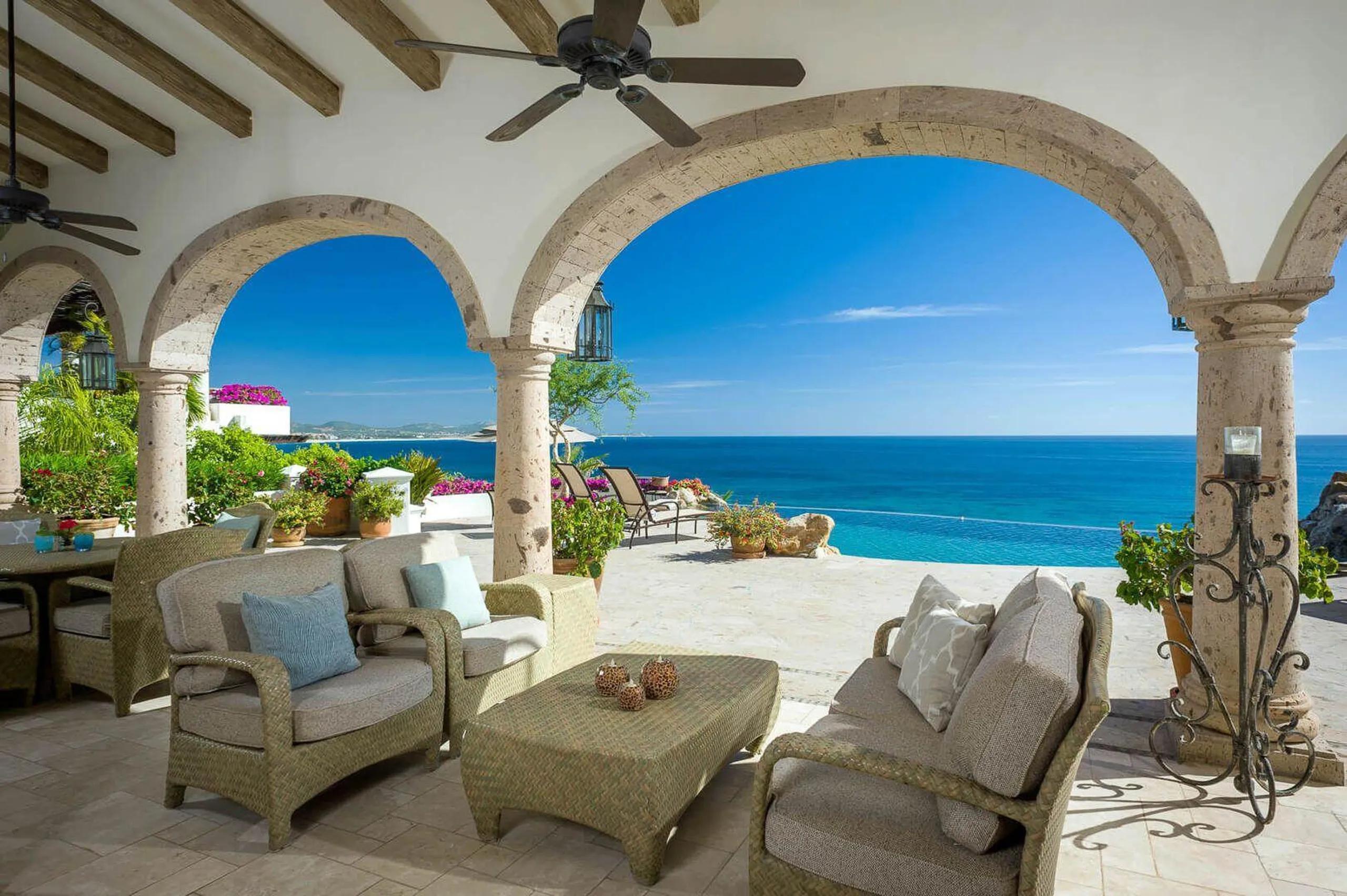 Spanish Colonial Architectural Palmilla Estate with Infinity Pool and Sweeping Ocean Views — photograph 9