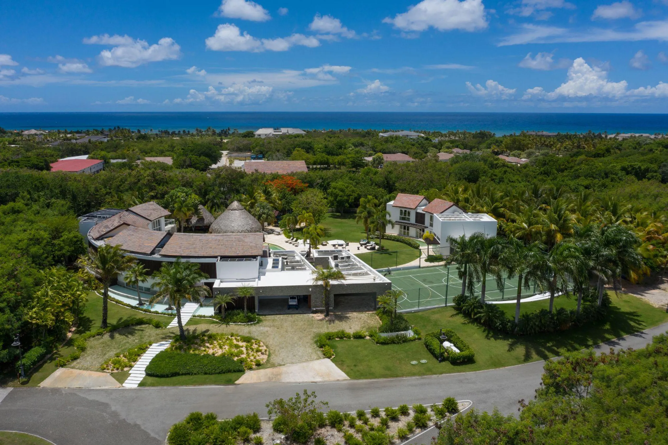 Soaring Resort-style Circular Villa with Multiple Pools, and Sports Court — photograph 8
