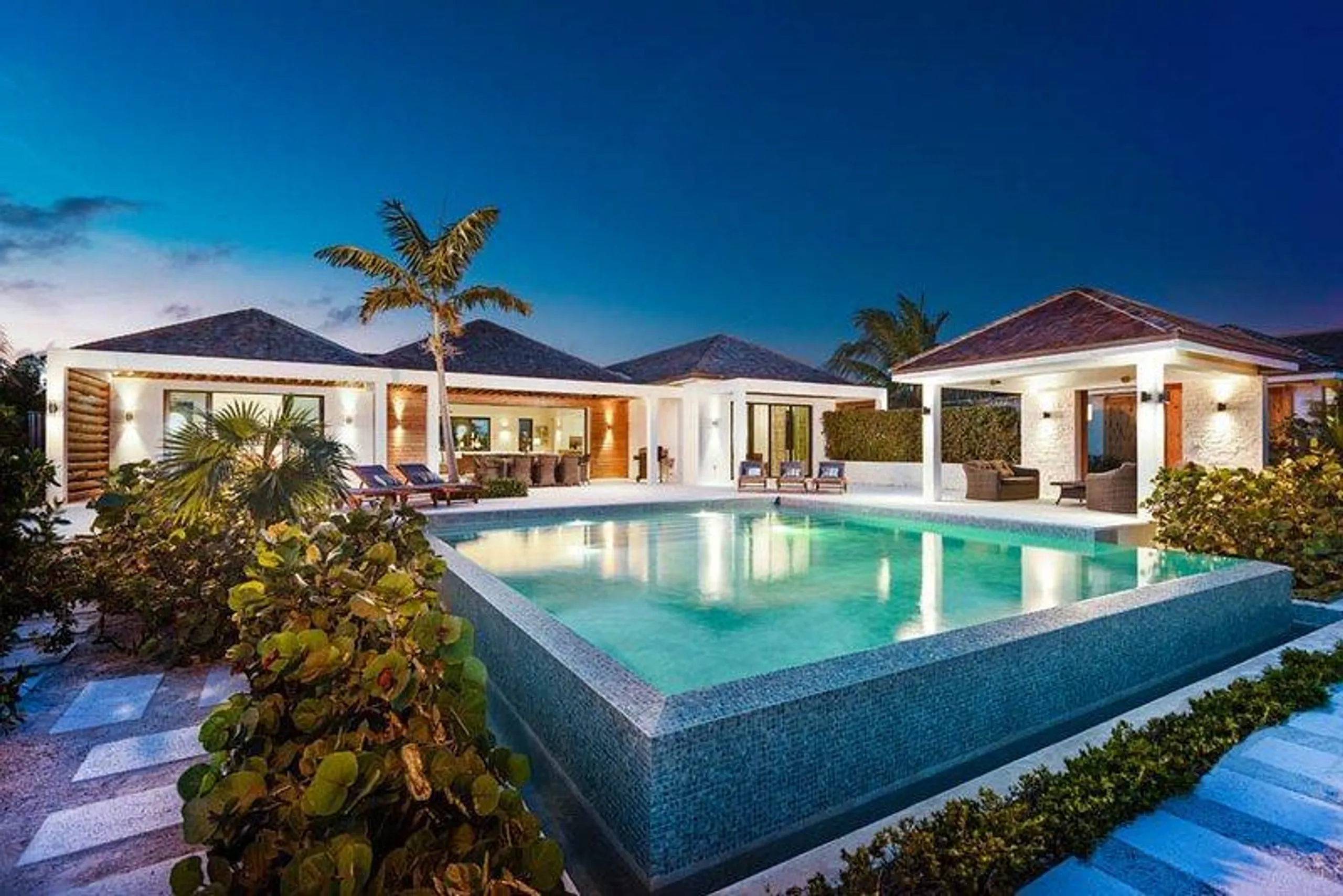Refined Contemporary Beachfront Long Bay Beach Villa with Infinity Pool, Long Bay Beach