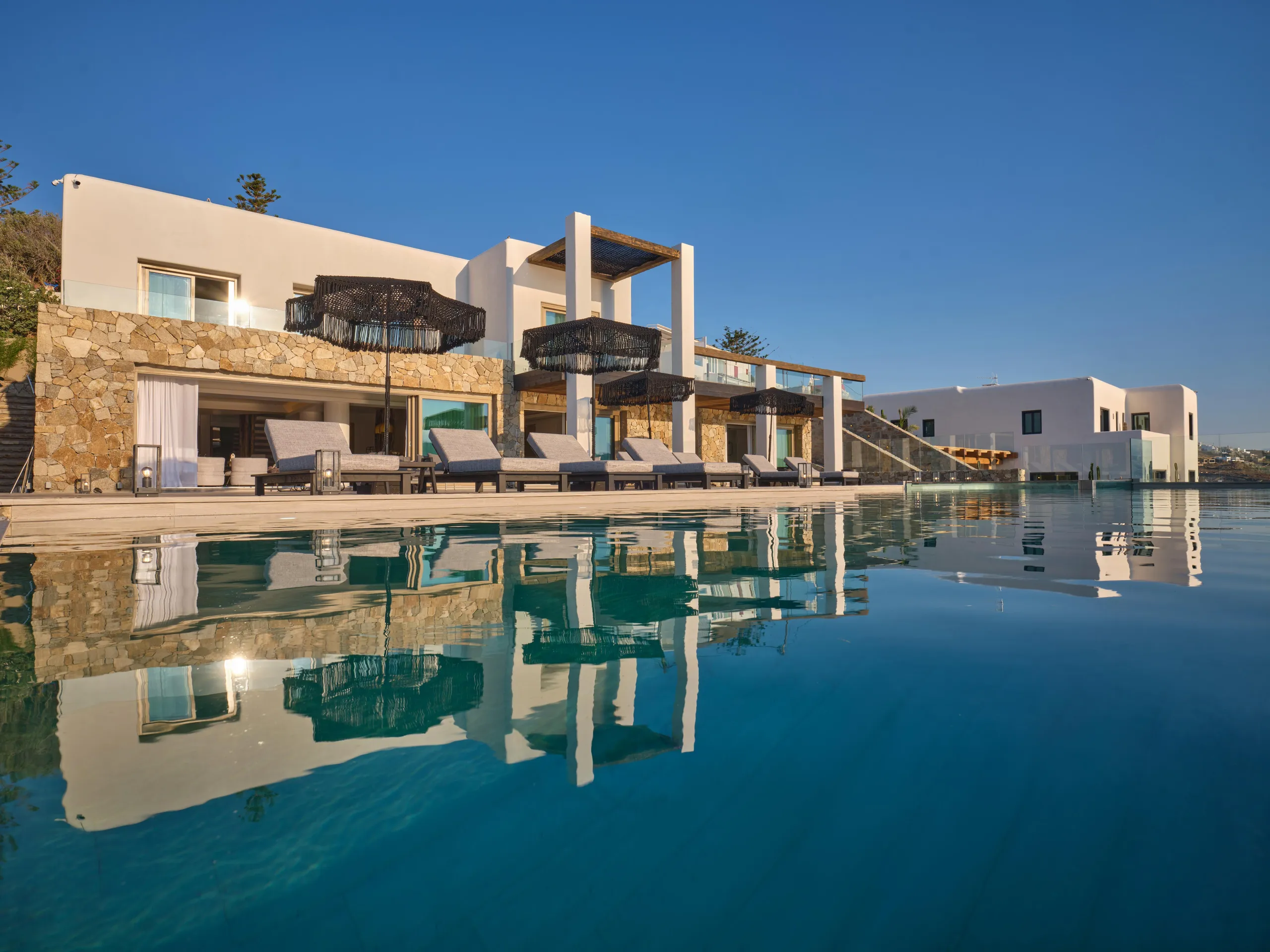 Enchanted Luxury Villa with 11BR, Captivated Ocean Front Retreat in Mykonos