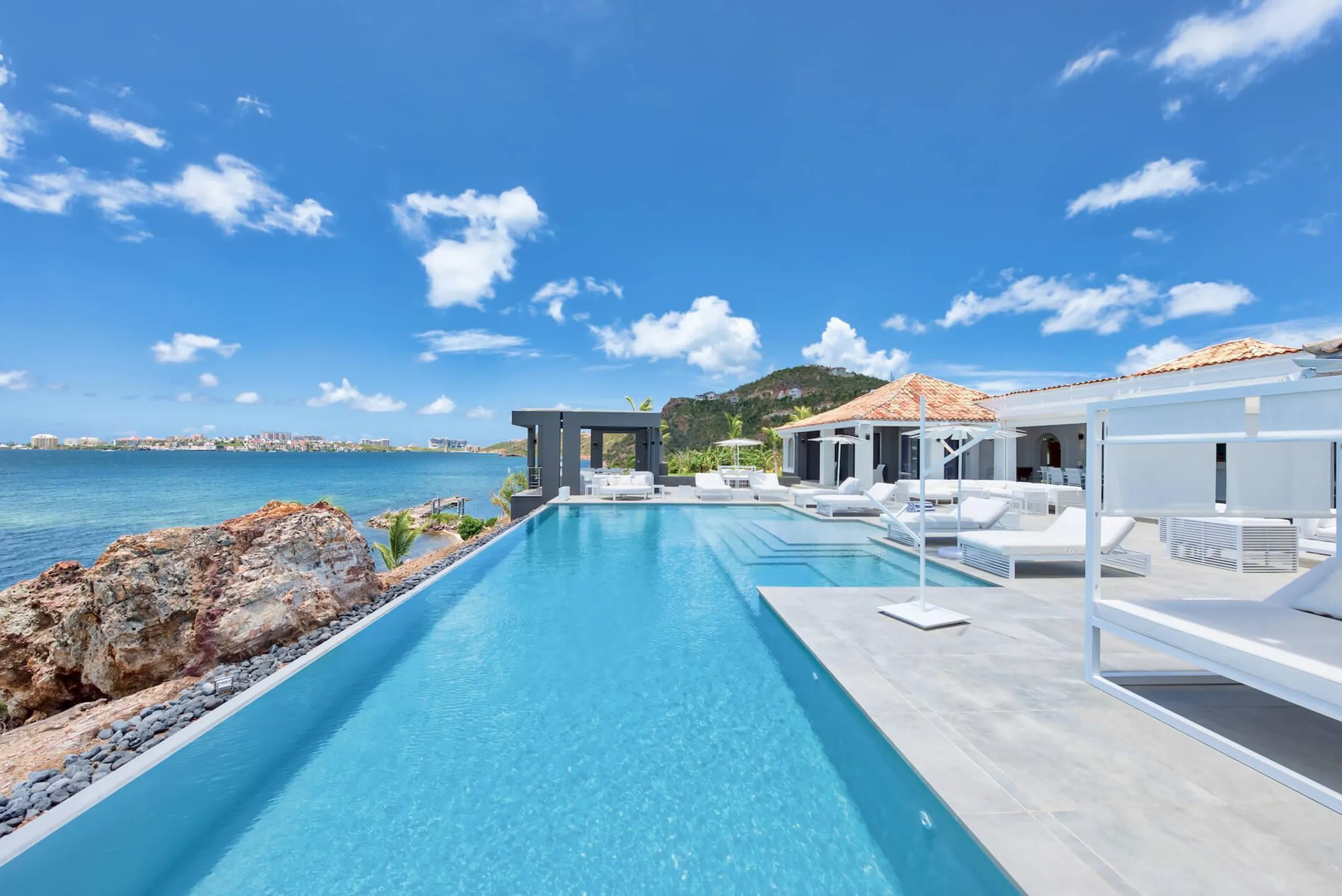 Secluded Hillside Private Luxury Villa with Infinity Pool and Private Beach with Dock, Terres Basses