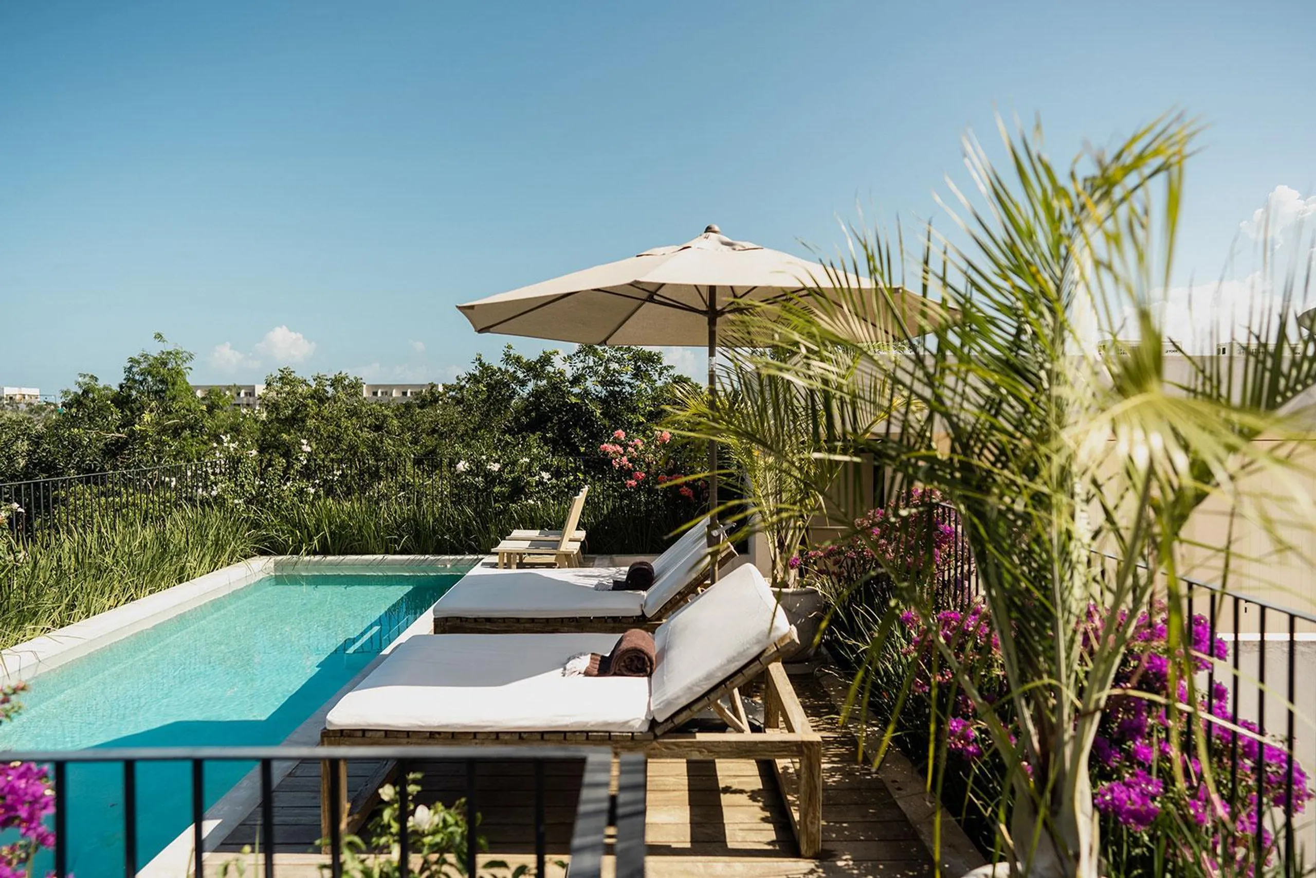 Lush and Tropical Tulum Eco-Luxe Villa with Rooftop Pool and Views, Tulum