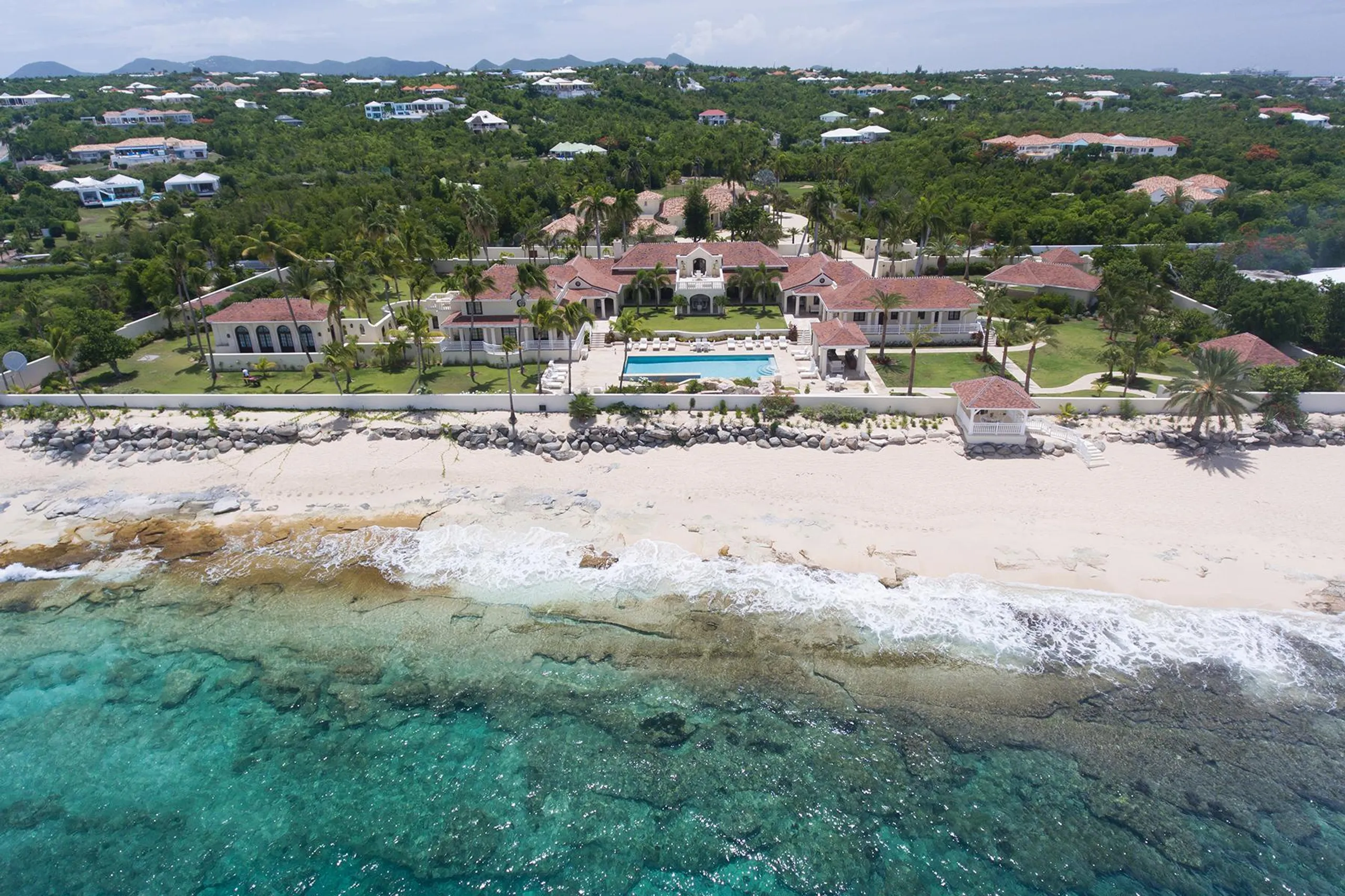 Luxury Redefined: Grand Luxe  Estate with Elegant Pool and Caribbean Views — photograph 2
