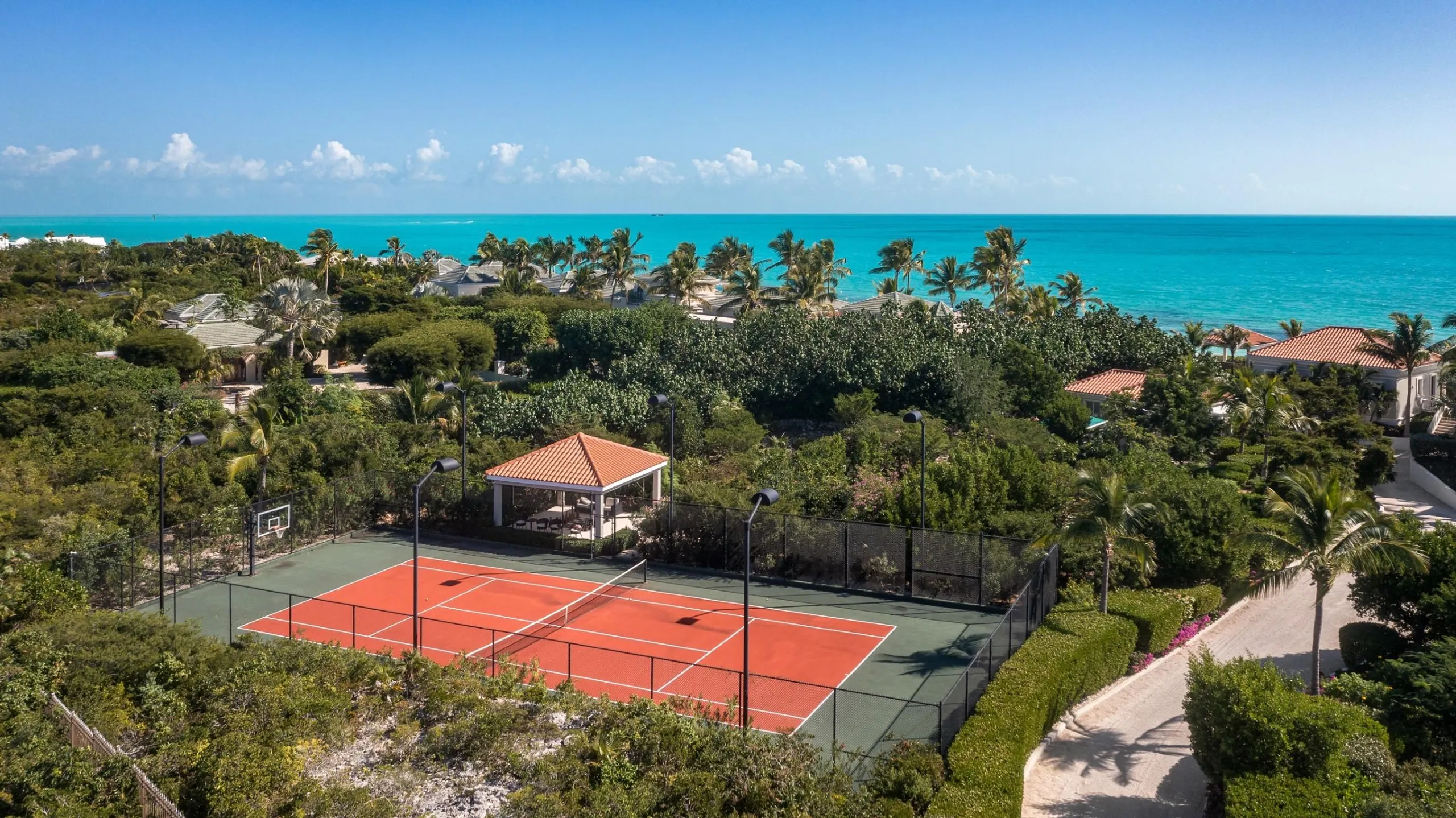 Stunning Luxury Estate in Long Bay with Oceanfront Views, Tennis, and Private Infinity Pool — photograph 6