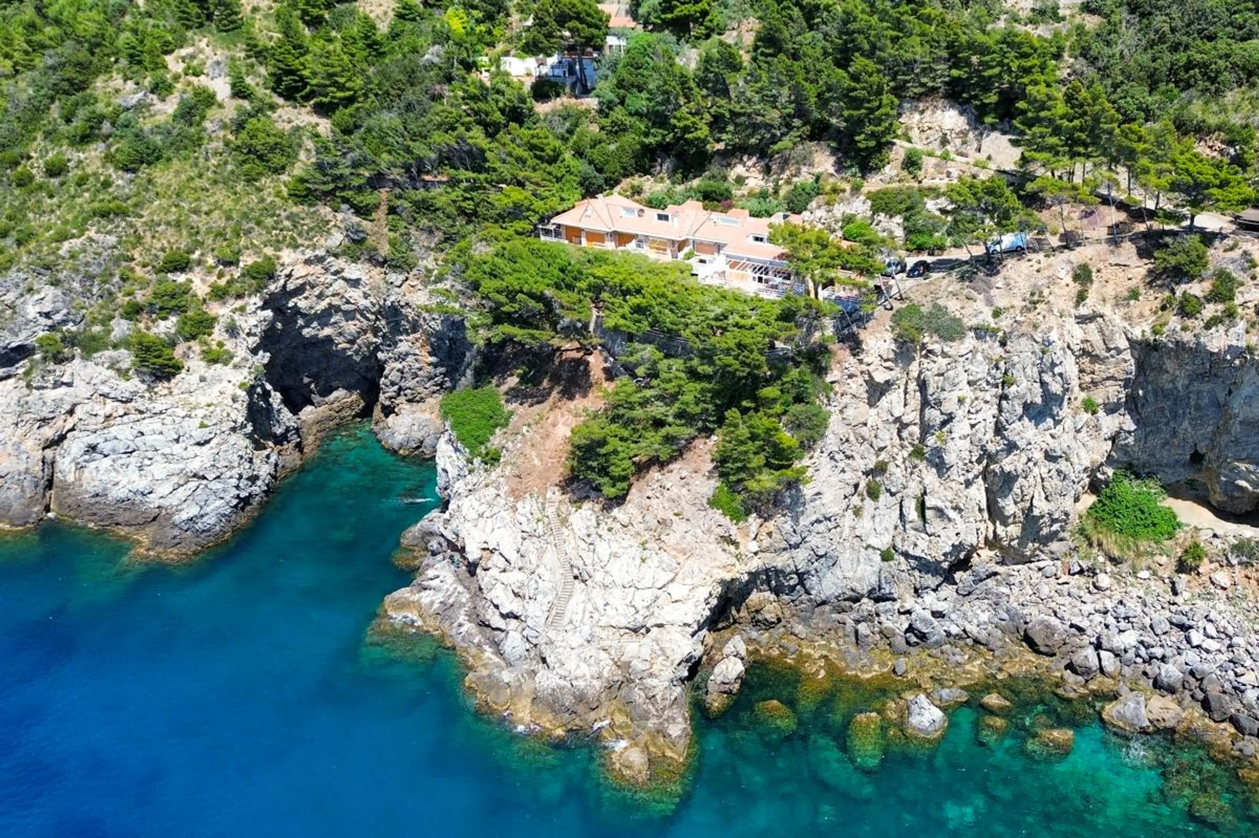 Resplendent Cliffside Villa with Magnificent Ocean Views and Patio, Cala Moresca