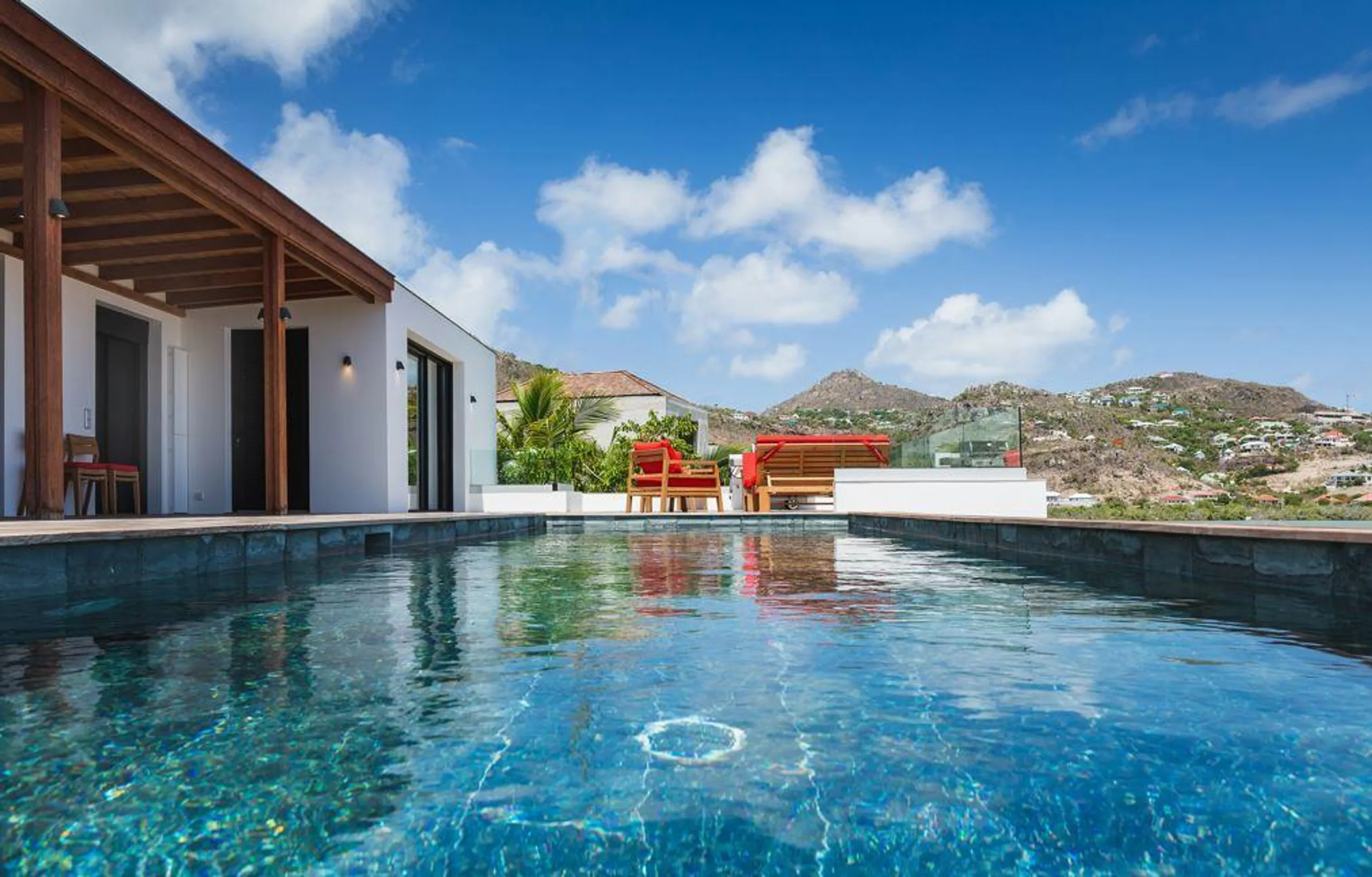 Sleek and Minimalist Inspired Villa with Heated Pool in Grand-Cul-de-Sac's Idyllic Paradise — photograph 2
