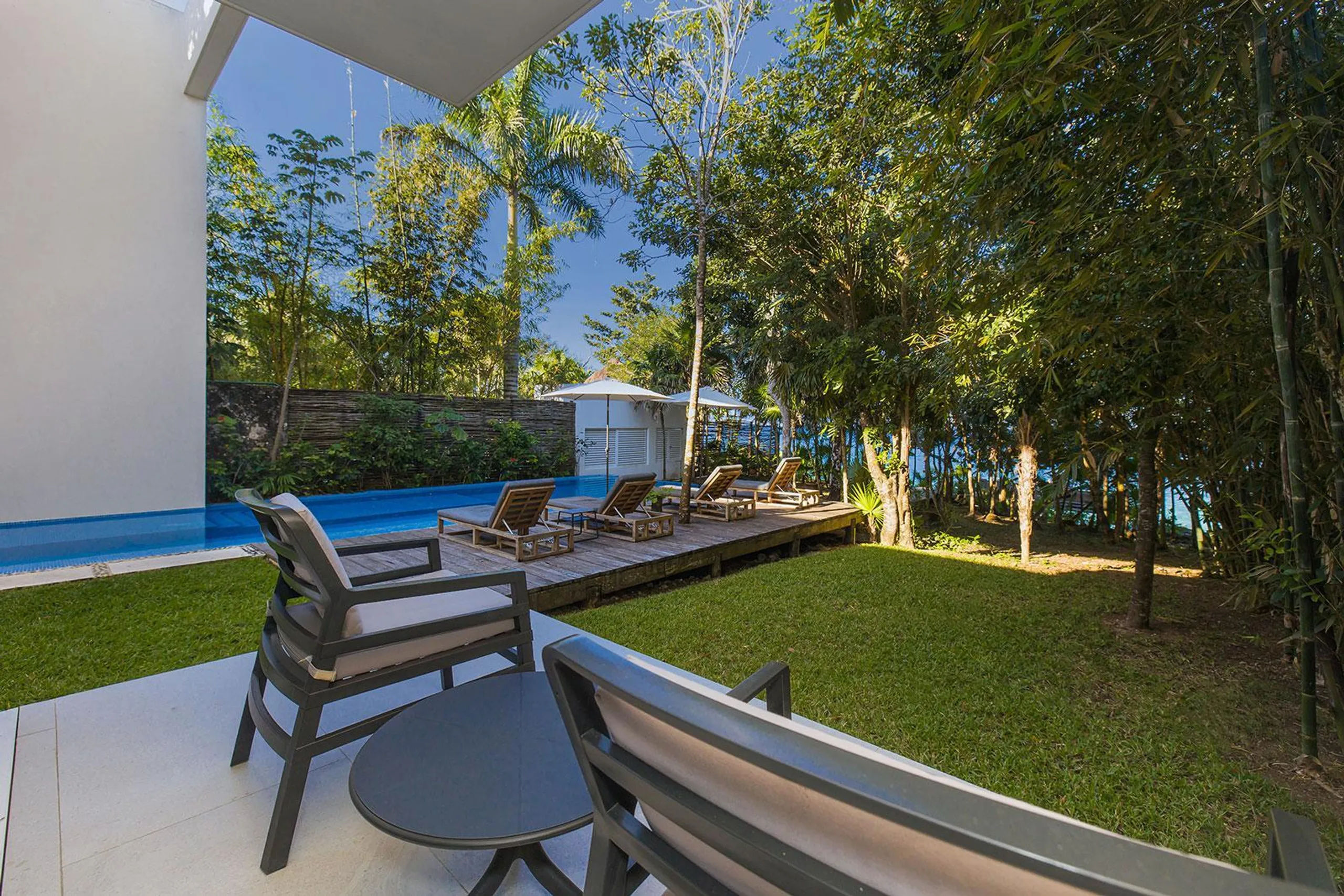 Modern Architectural Estate with Private Pool and Dock Access — photograph 9