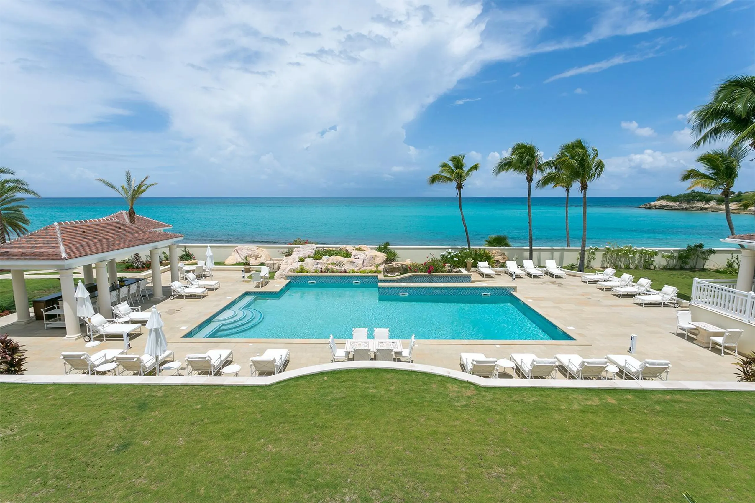 Luxury Redefined: Grand Luxe  Estate with Elegant Pool and Caribbean Views — photograph 9