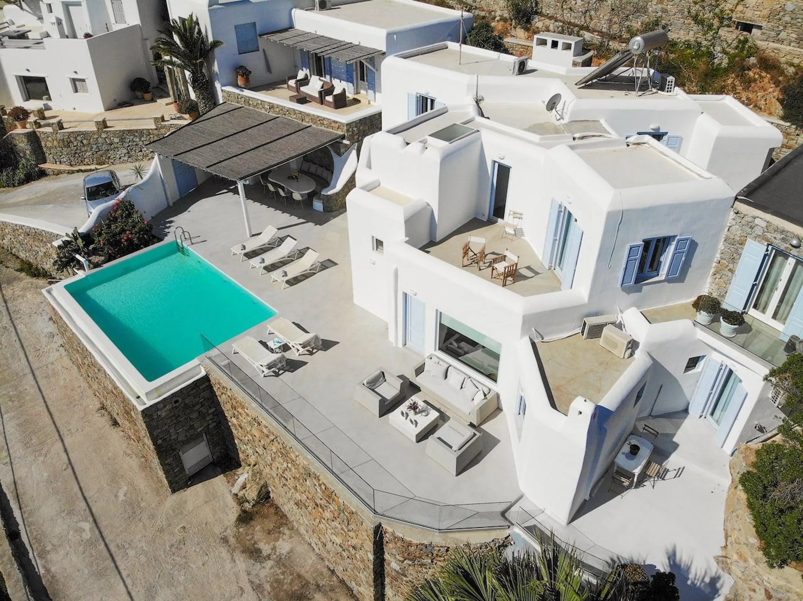 Gleaming Seven Bedroom Villa with Private Pool, and Psarou Bay Views — photograph 7