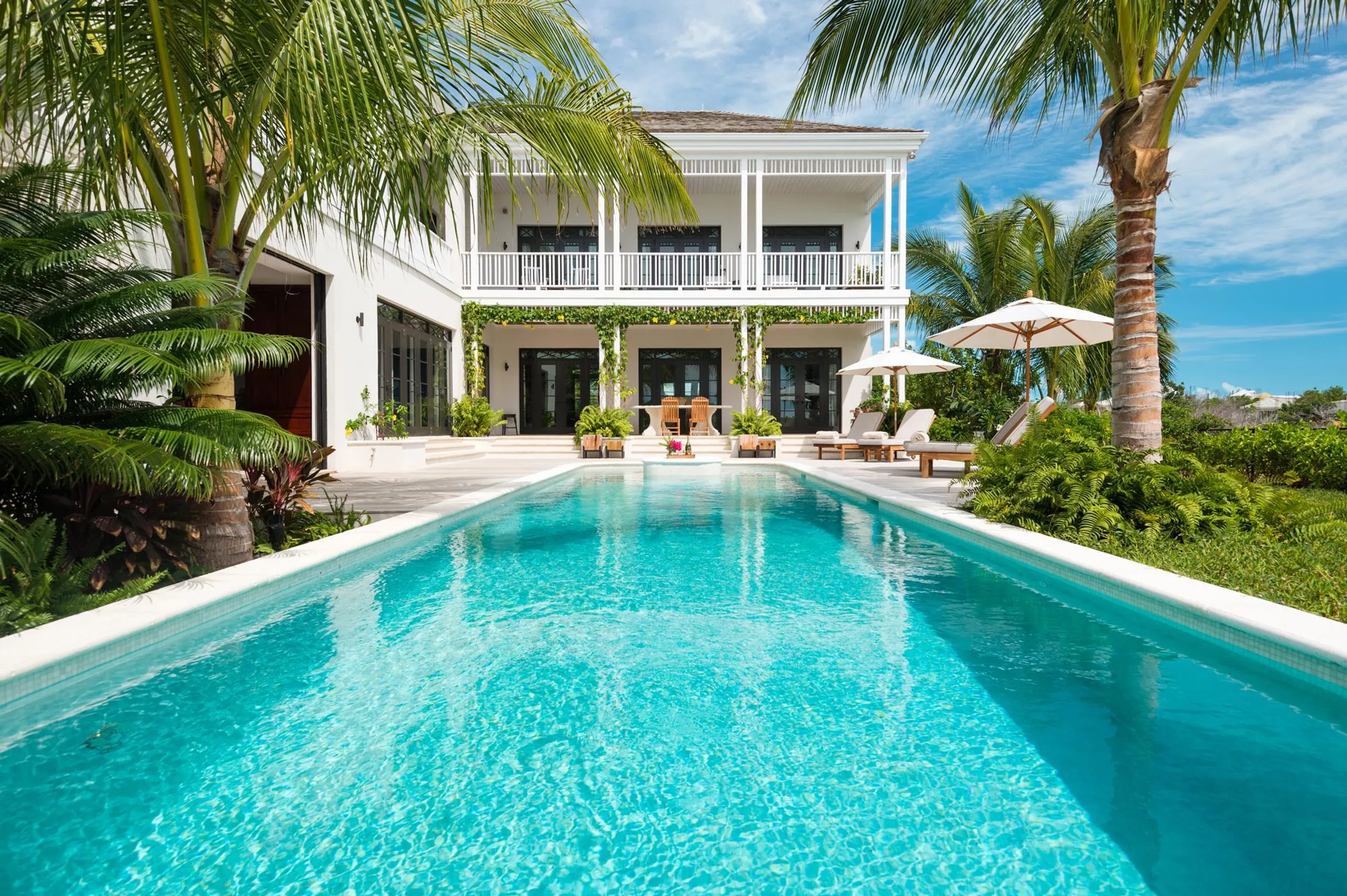 Majestic Colonial-Style Beachfront Haven with Private Pool on Grace Bay Beach — photograph 5