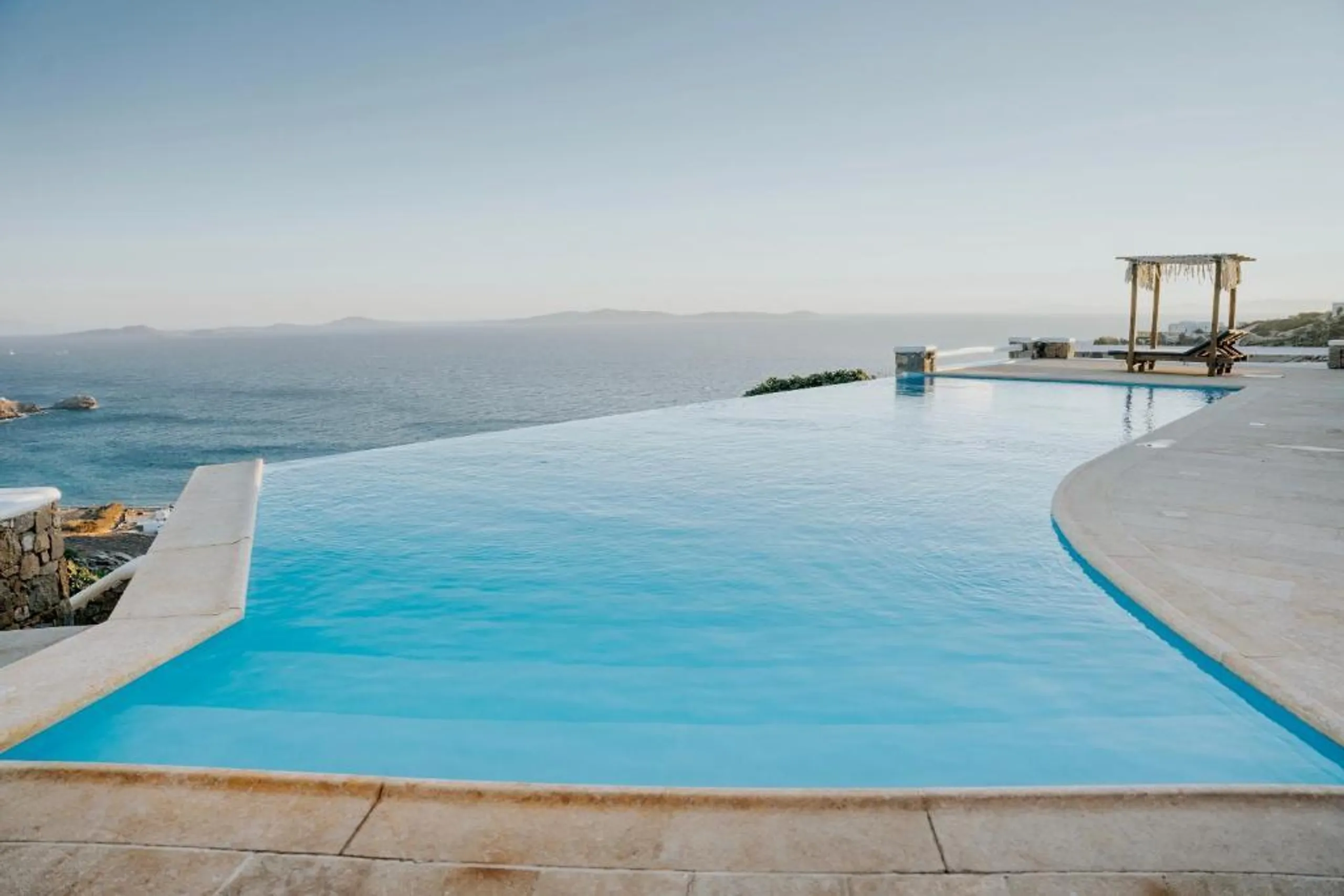 Immerse Yourself in a Private Infinity Pool Villa with Breathtaking Aegean Sea Views — photograph 7