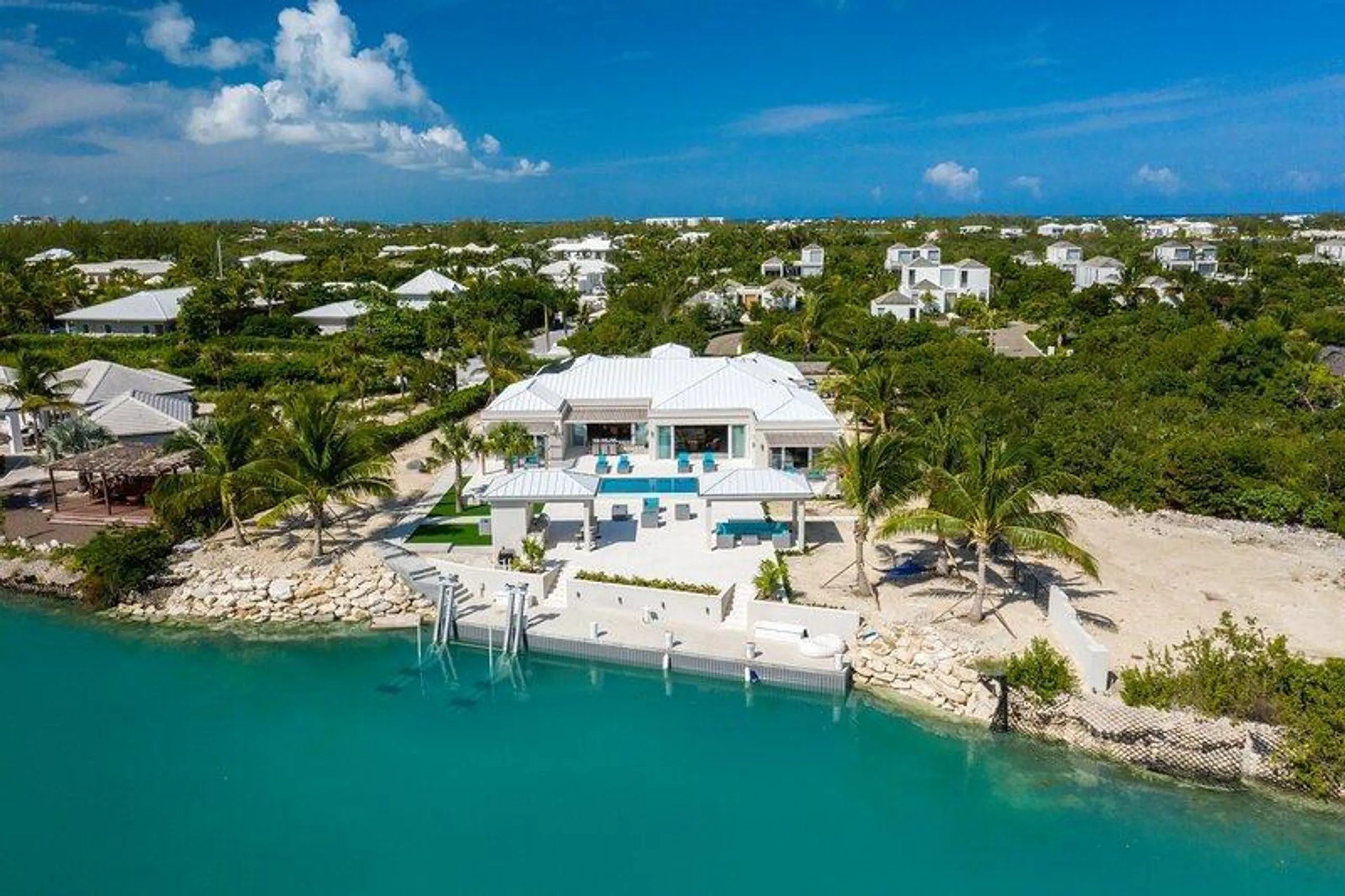 Awe-Inspiring Canal-Side Villa in Turks and Caicos with a Modern Island Flair, Leeward Settlement