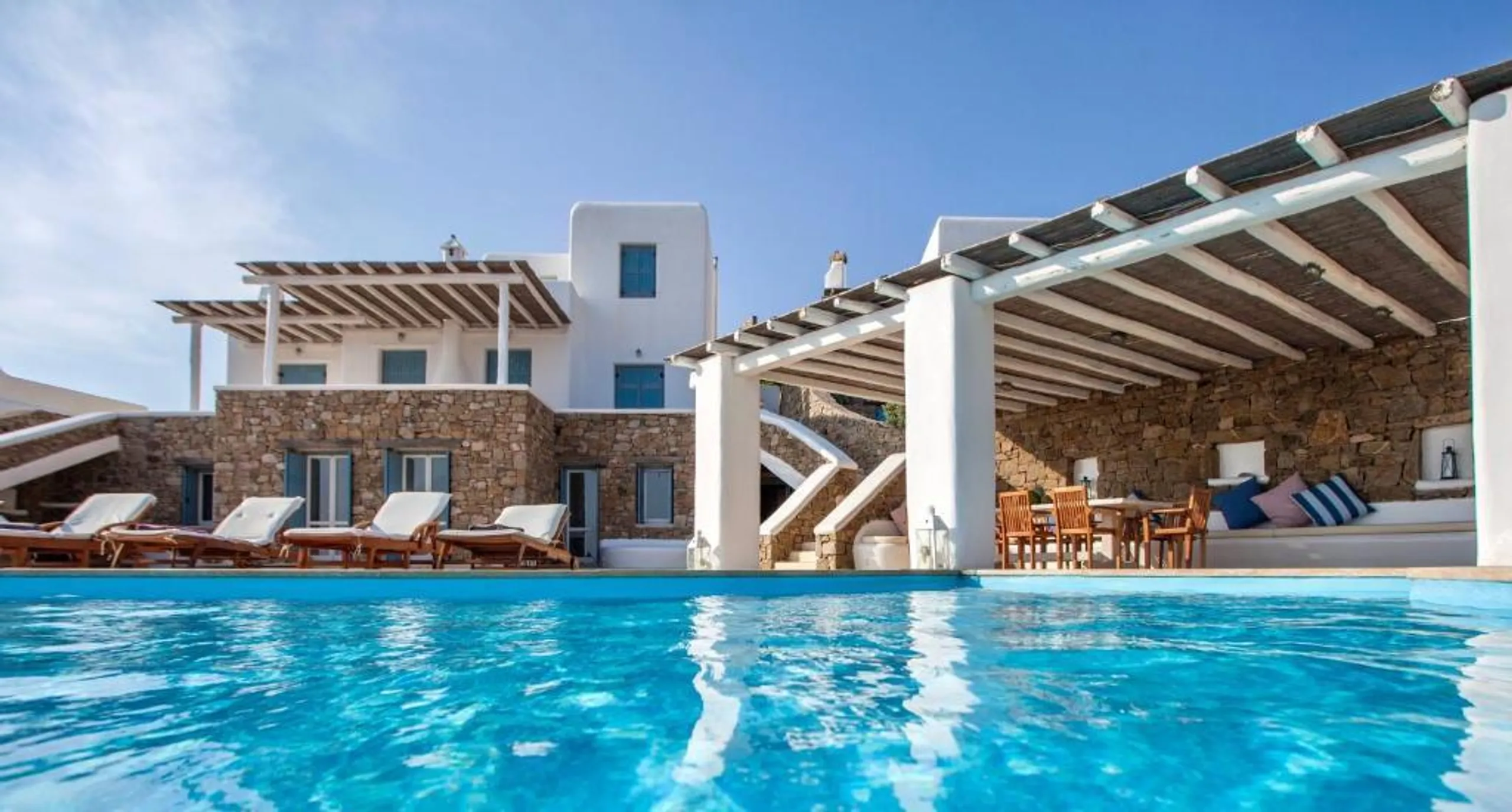 Immerse Yourself in a Private Infinity Pool Villa with Breathtaking Aegean Sea Views — photograph 3
