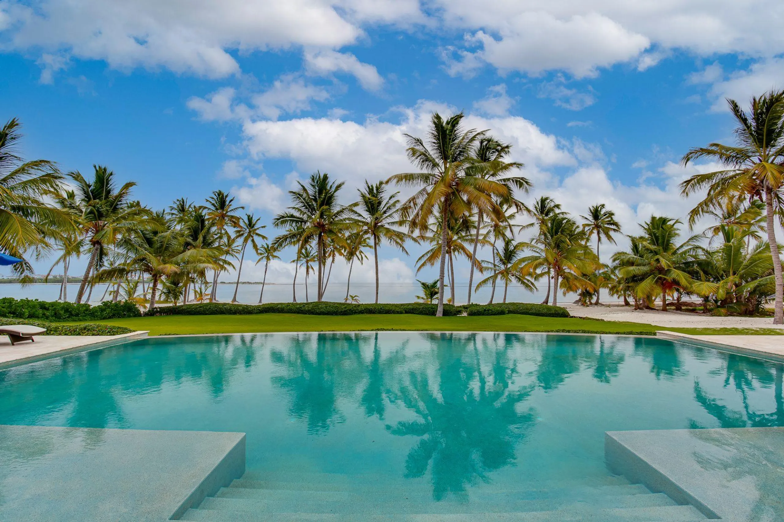 Splendid Beachfront Estate with Invigorating Pool and Grand Garden Grounds, Punta Cana