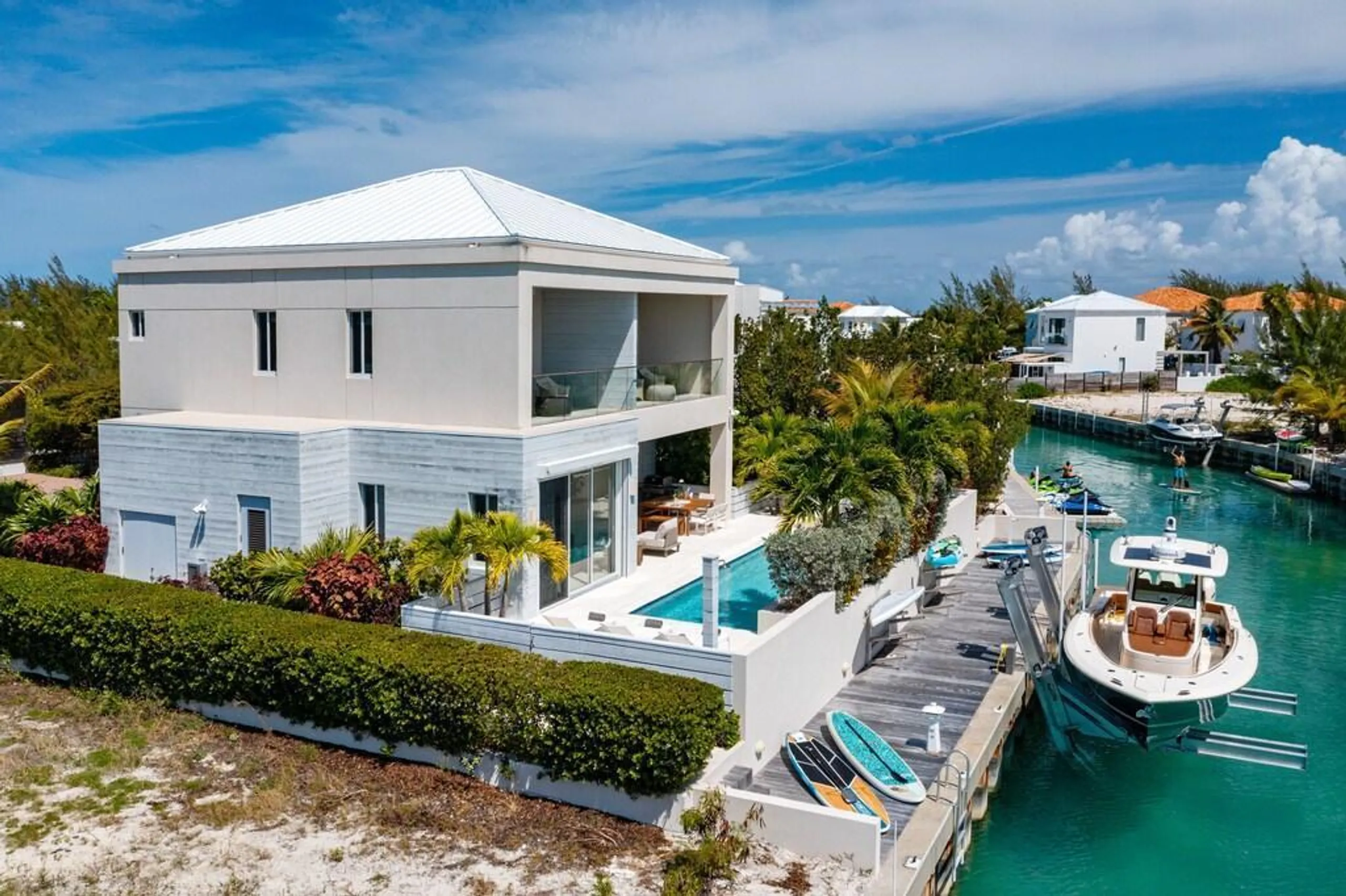 Side by Side Canal Front Dual Homes with Private Pools and Boat Dock, Leeward Settlement