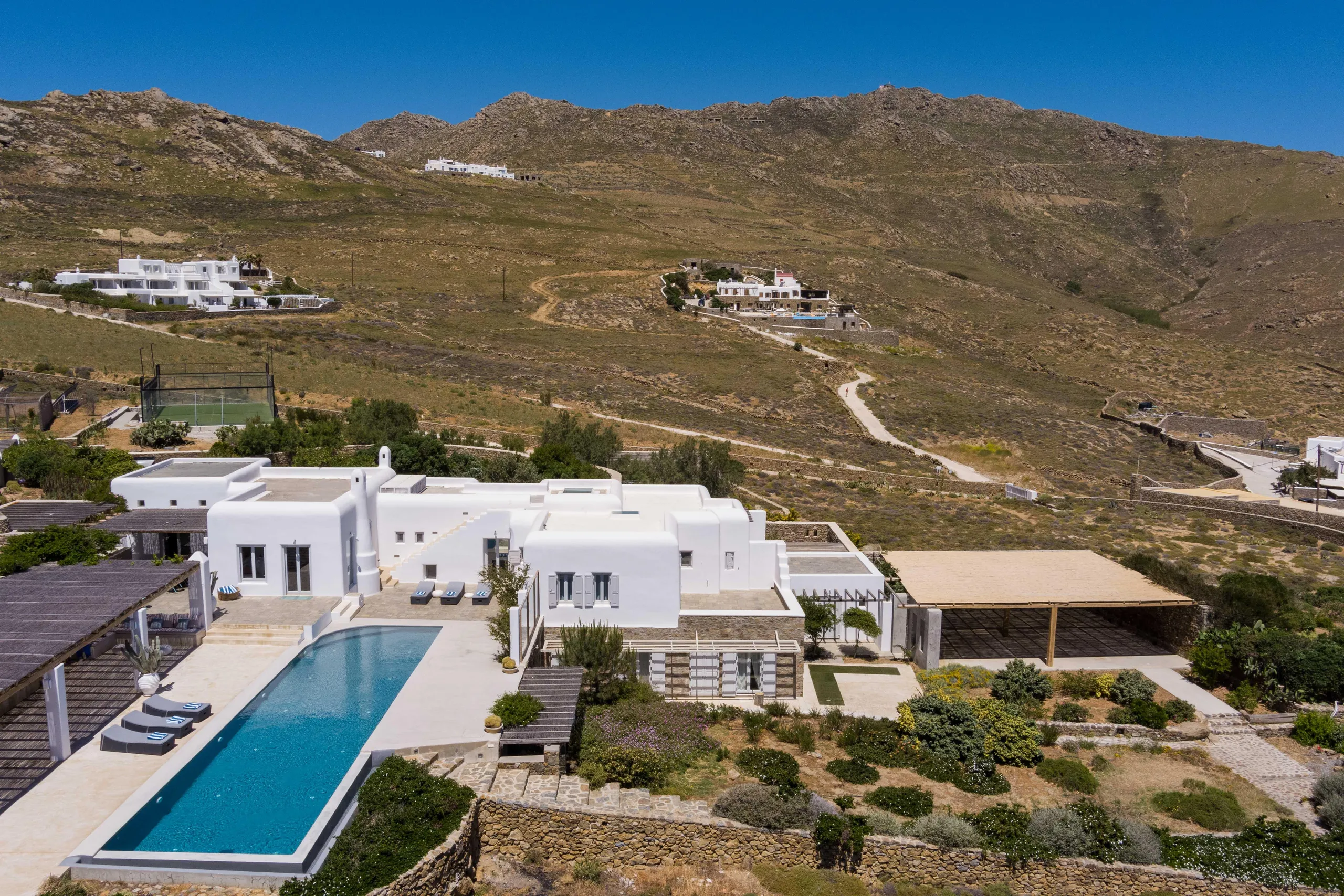 Immaculate Mykonos Villa with Designer Touches, Private Pool, Padel Court, and Panoramic Mediterranean Views — photograph 5