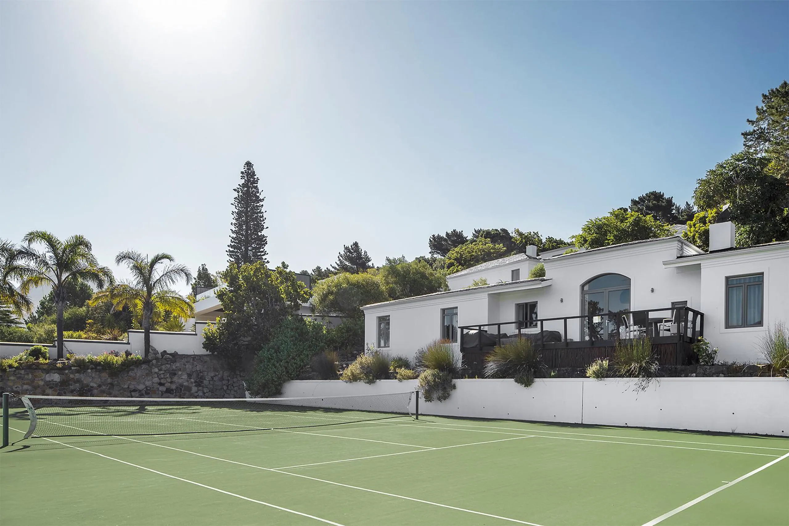 Contemporary Serene Retreat with Pool and Tennis Court — photograph 5