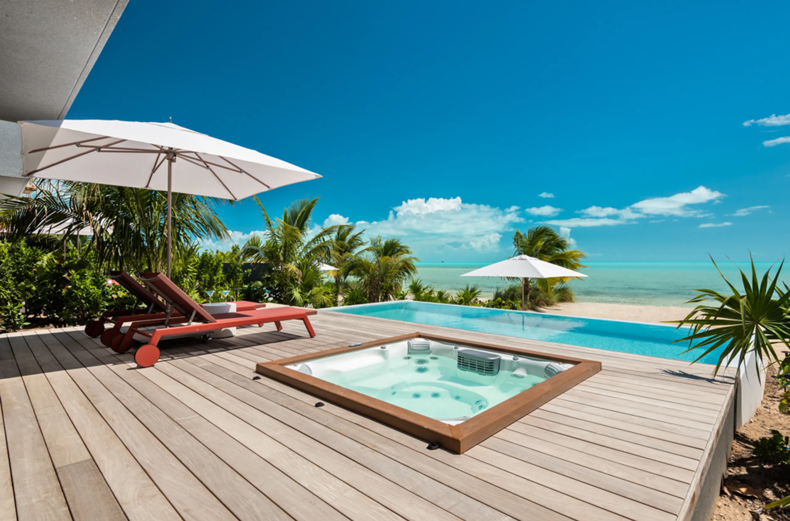 Stunning Two-Story Long Bay Oceanfront Beach House with Infinity Pool, Long Bay Beach
