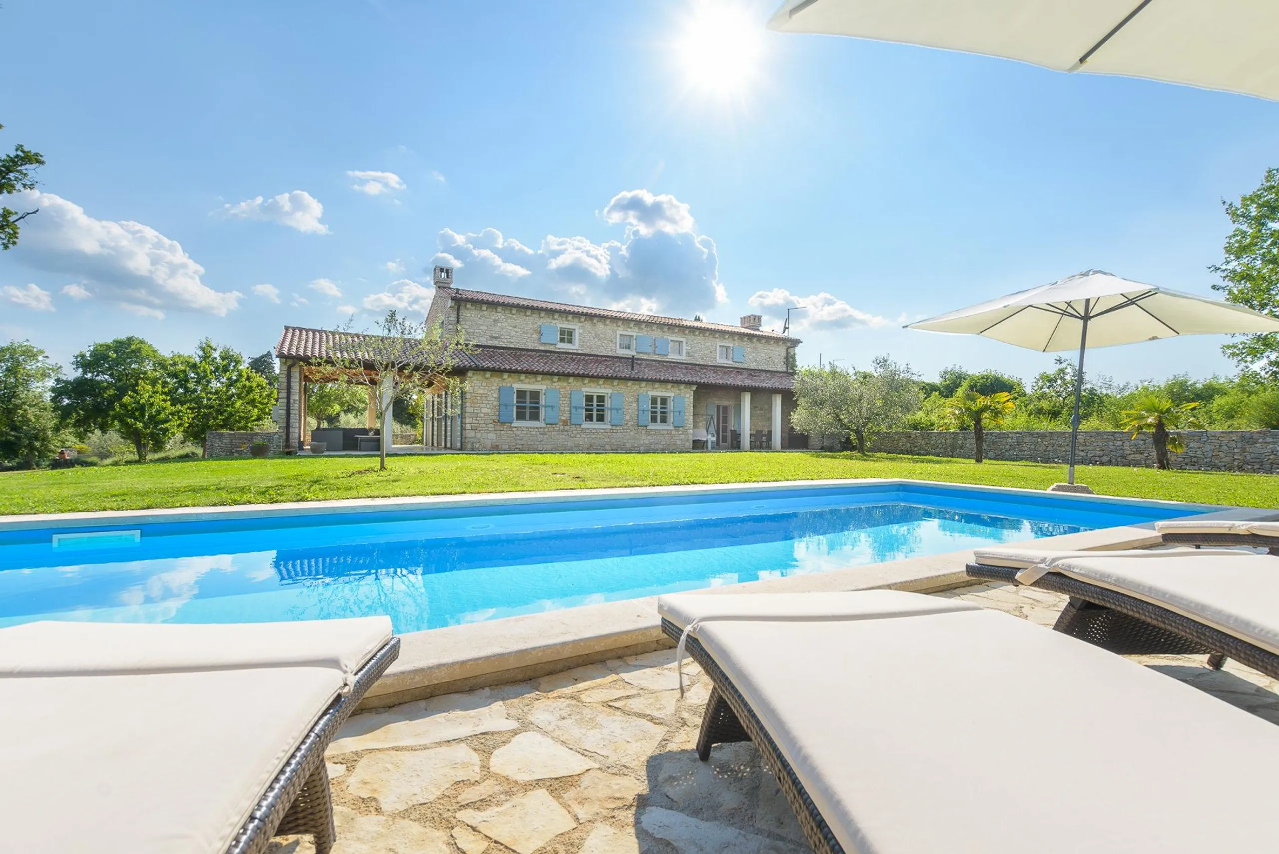 Ornate Villa with L Shaped- Pool with Serene Park Views from — photograph 2