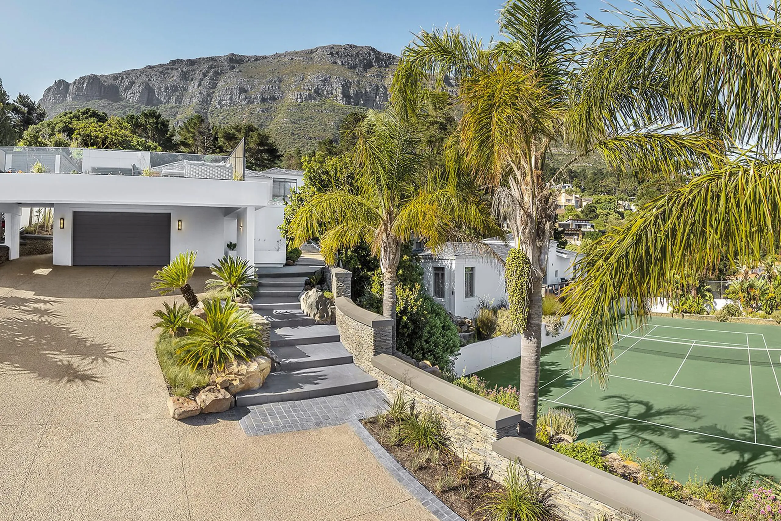 Contemporary Serene Retreat with Pool and Tennis Court — photograph 3