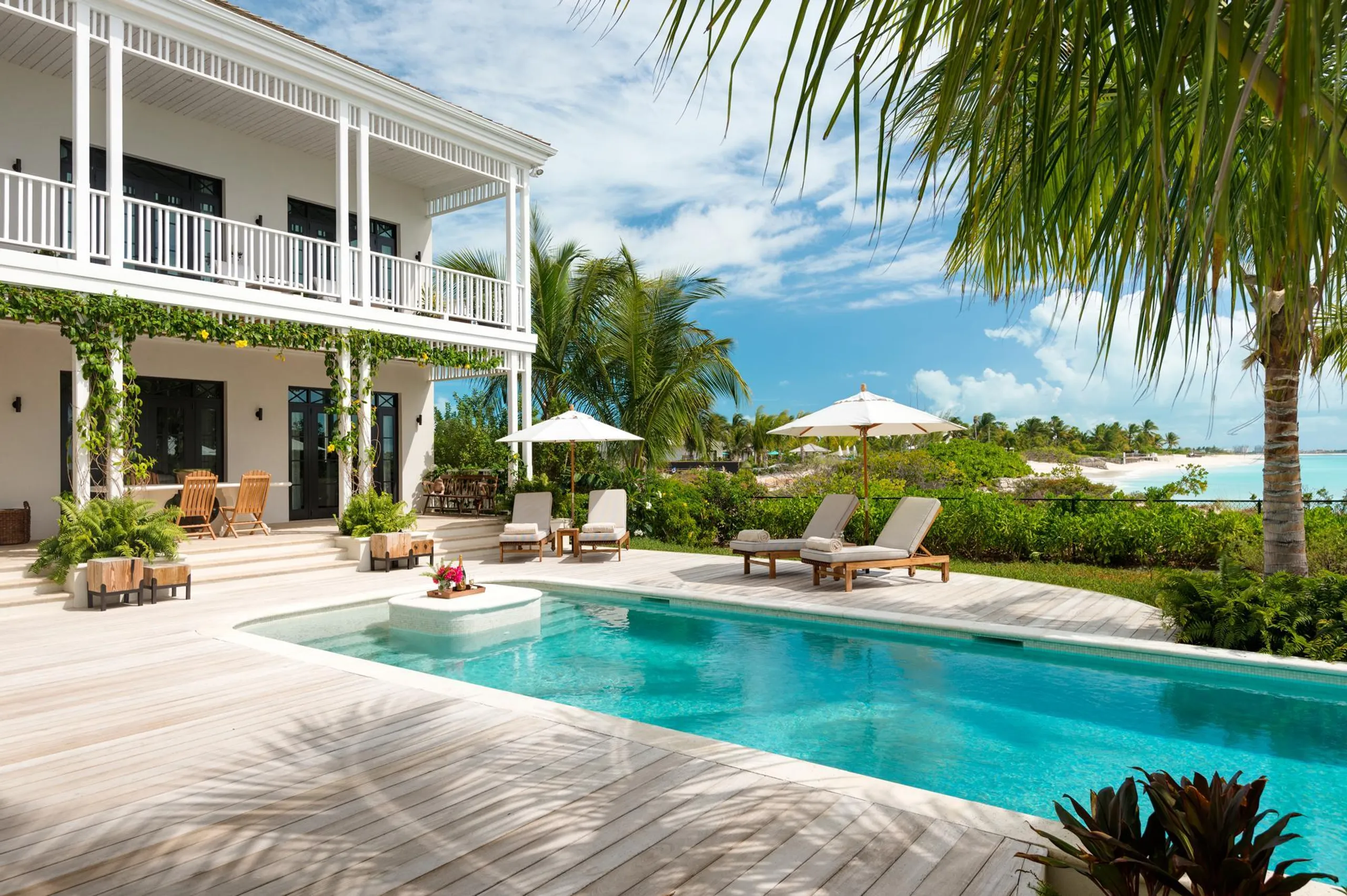 Majestic Colonial-Style Beachfront Haven with Private Pool on Grace Bay Beach — photograph 2