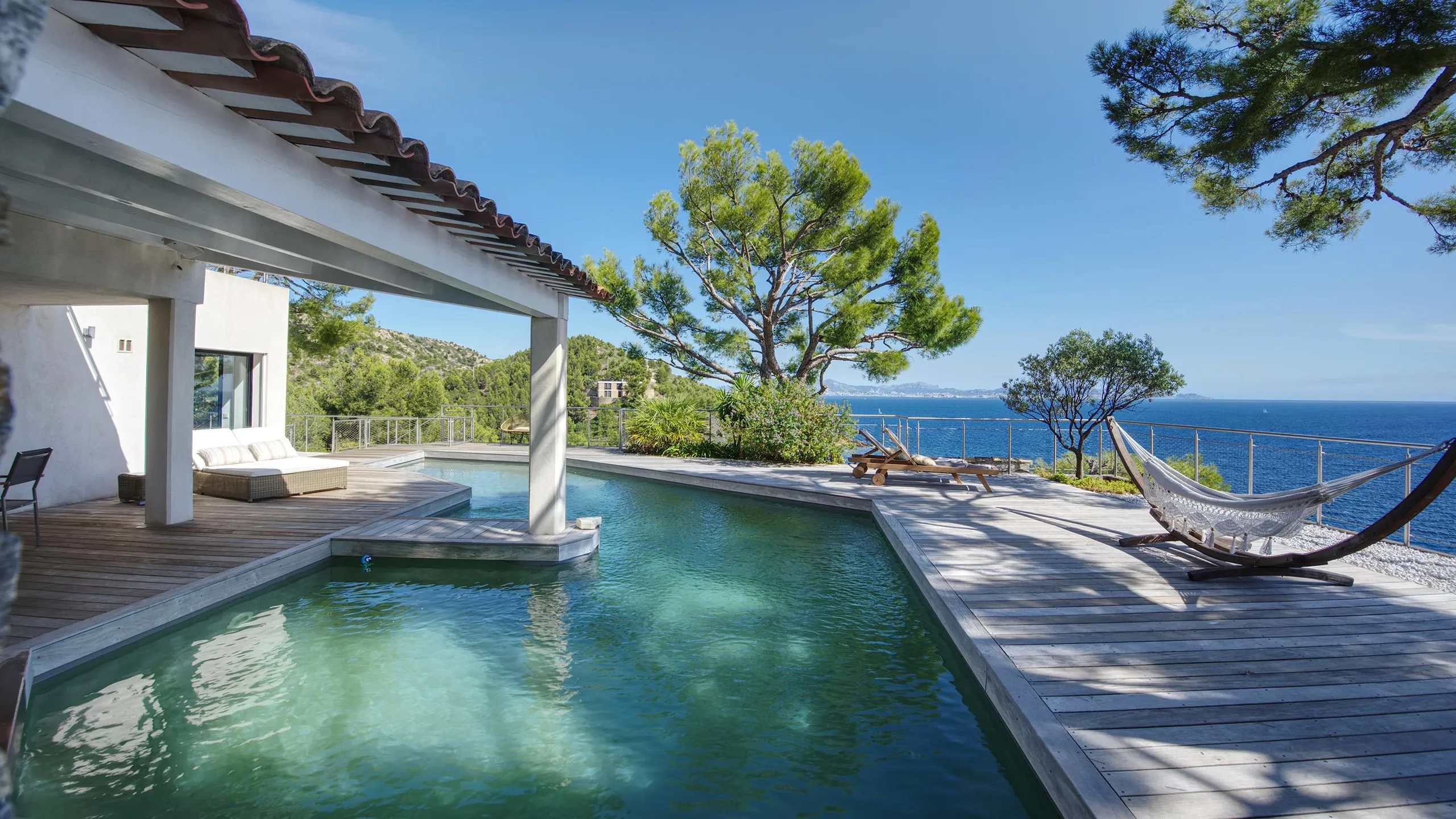 Refined Retreat with Poolside Serenity — photograph 2