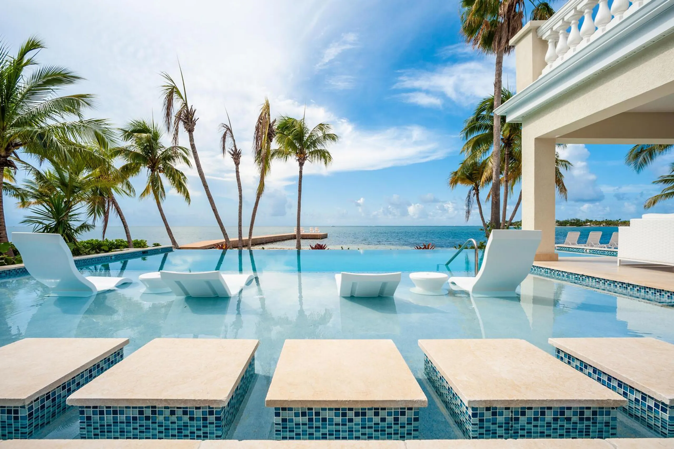 Cayman Kai Crystal Waters Estate with Private Resort Pool, Beach, and Dock, Rum Point