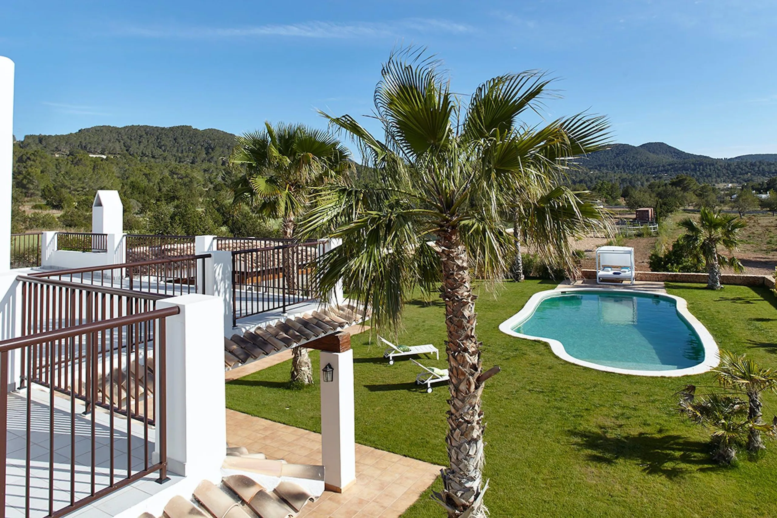 Ibizan Tranquility Terrace with Resort Pool — photograph 10