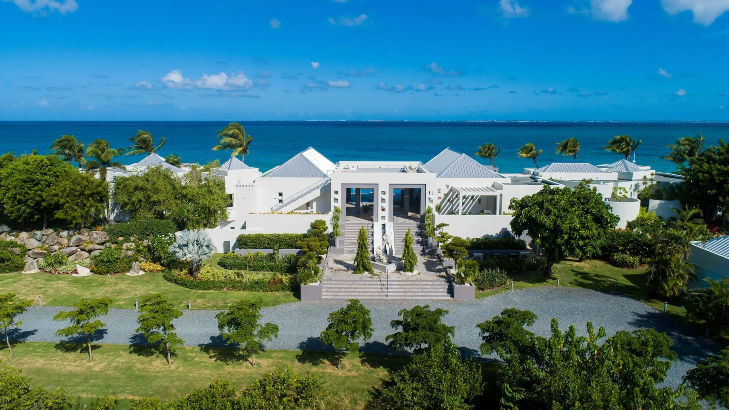 Exclusive Modern Contemporary Beachfront Estate with Infinity Pool, Terres Basses