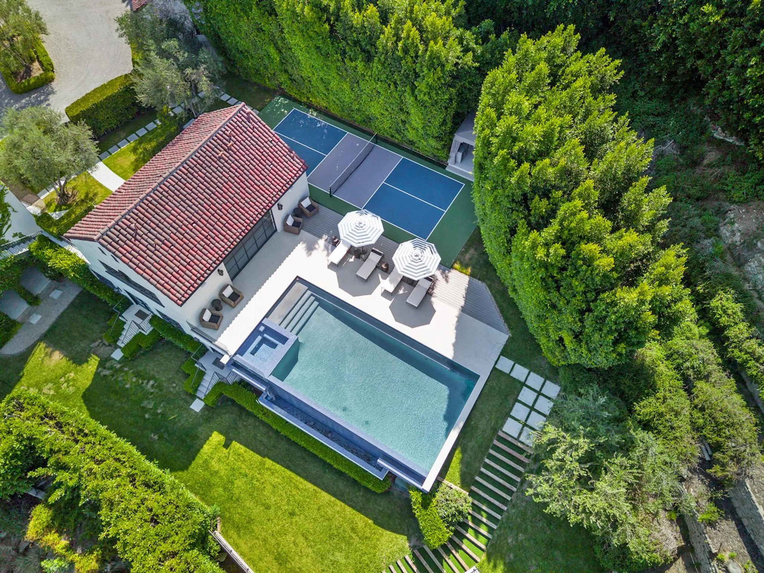 Mediterranean-Style Hollywood Hills Estate with Infinity Pool, Entertainment Room, and Panoramic Views — photograph 2