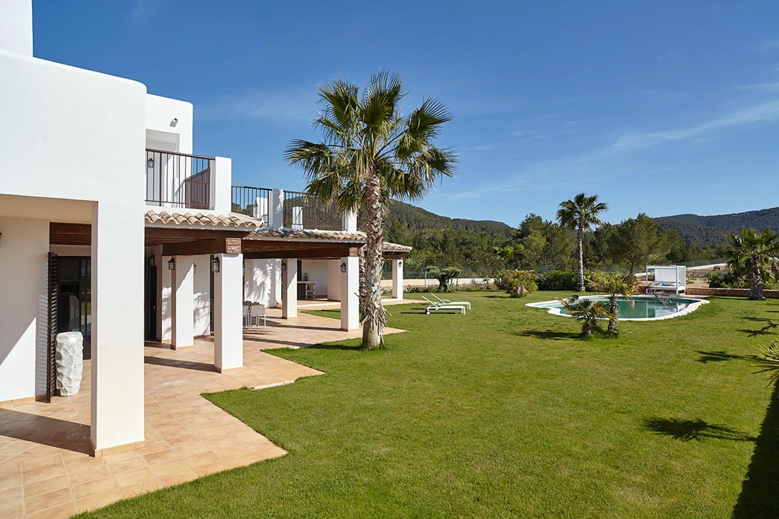Ibizan Tranquility Terrace with Resort Pool — photograph 2