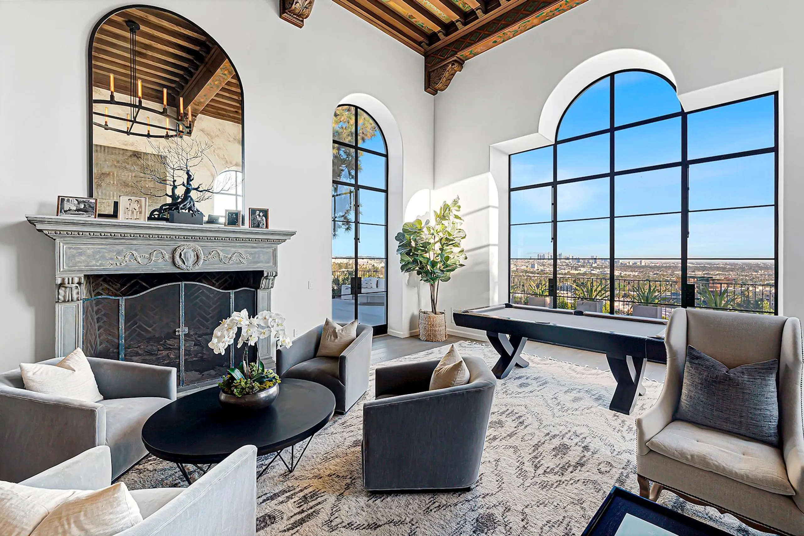 Mediterranean-Style Hollywood Hills Estate with Infinity Pool, Entertainment Room, and Panoramic Views — photograph 7