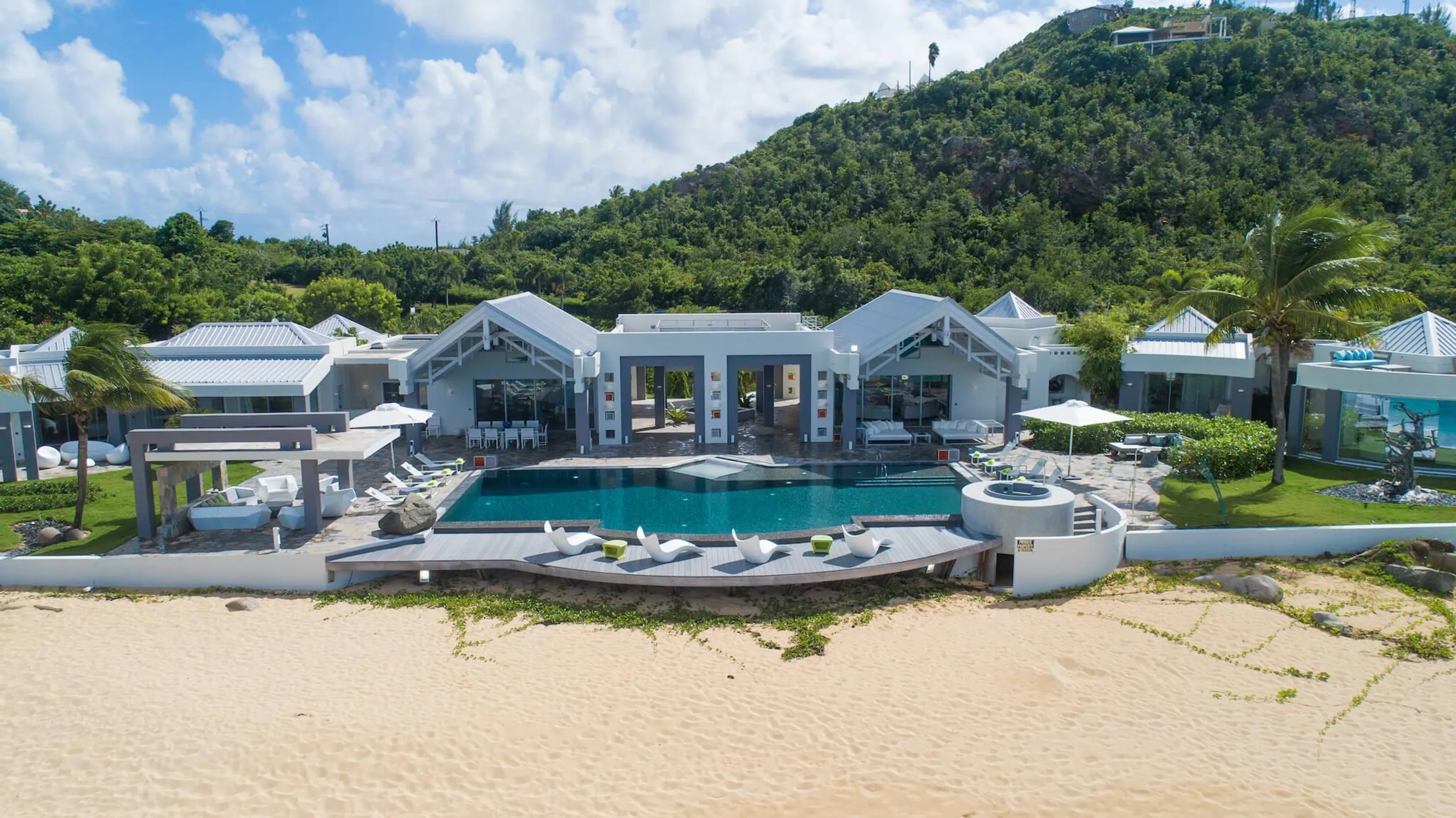 Exclusive Modern Contemporary Beachfront Estate with Infinity Pool in Terres Basses