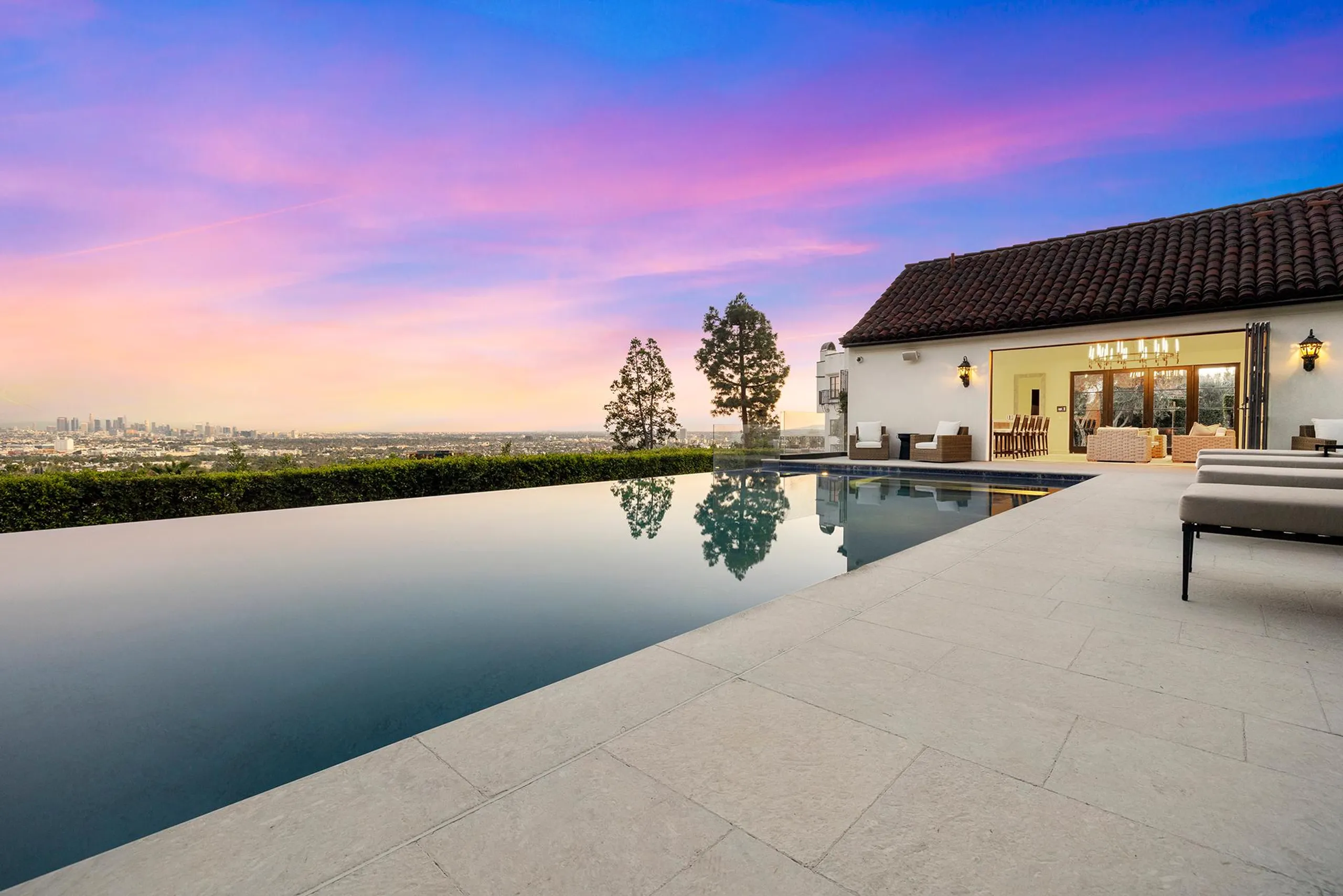 Mediterranean-Style Hollywood Hills Estate with Infinity Pool, Entertainment Room, and Panoramic Views — photograph 3