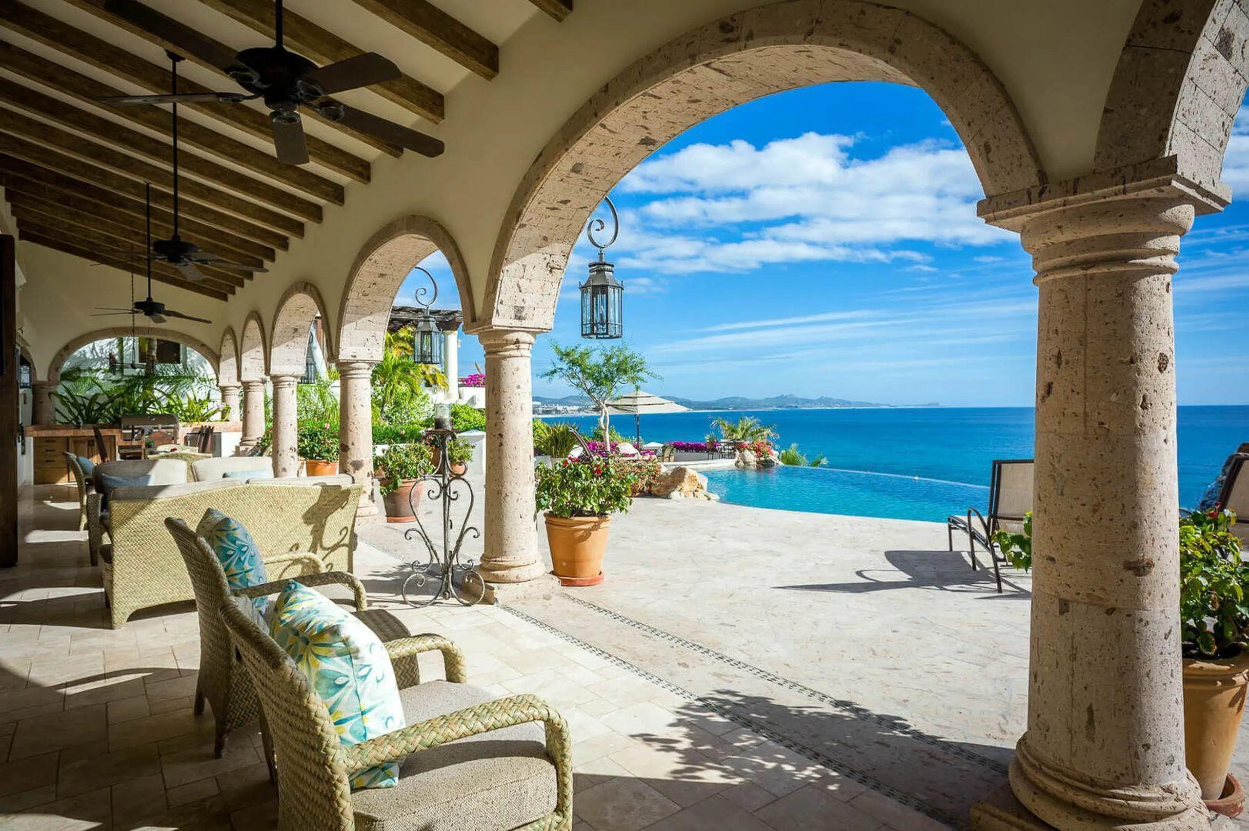 Spanish Colonial Architectural Palmilla Estate with Infinity Pool and Sweeping Ocean Views — photograph 8