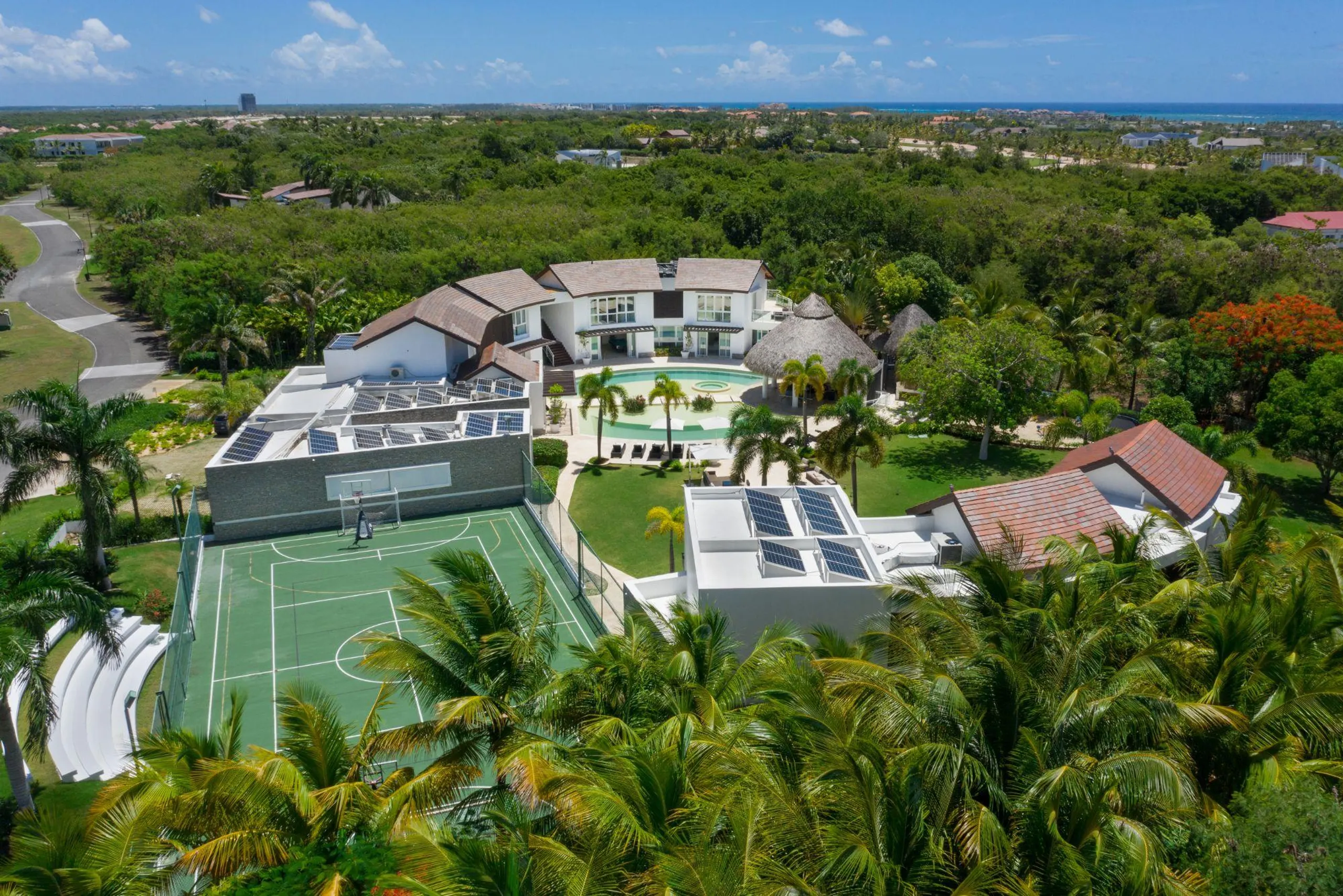 Soaring Resort-style Circular Villa with Multiple Pools, and Sports Court — photograph 5