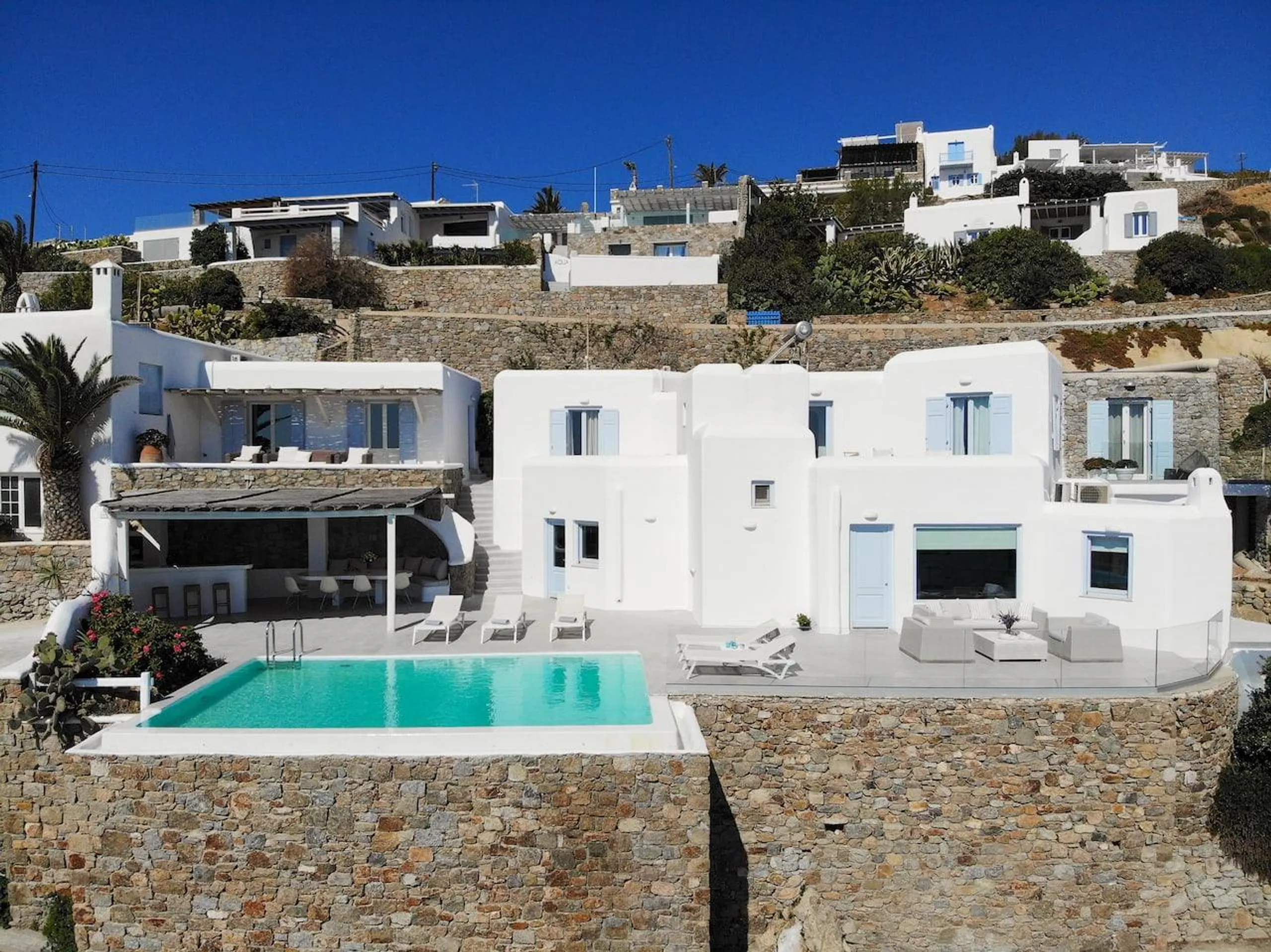 Gleaming Seven Bedroom Villa with Private Pool, and Psarou Bay Views — photograph 4