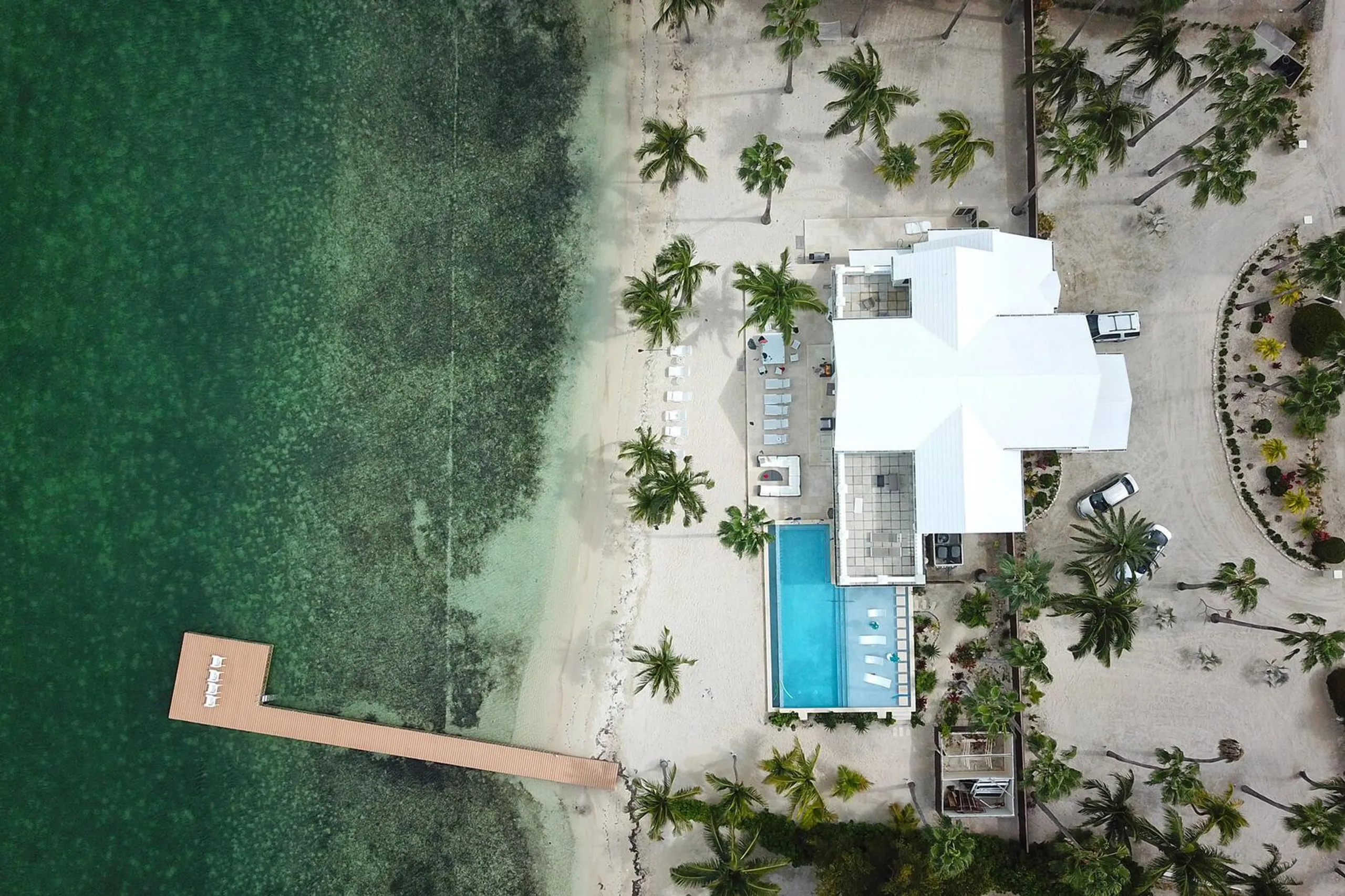 Cayman Kai Crystal Waters Estate with Private Resort Pool,  Beach, and Dock — photograph 2