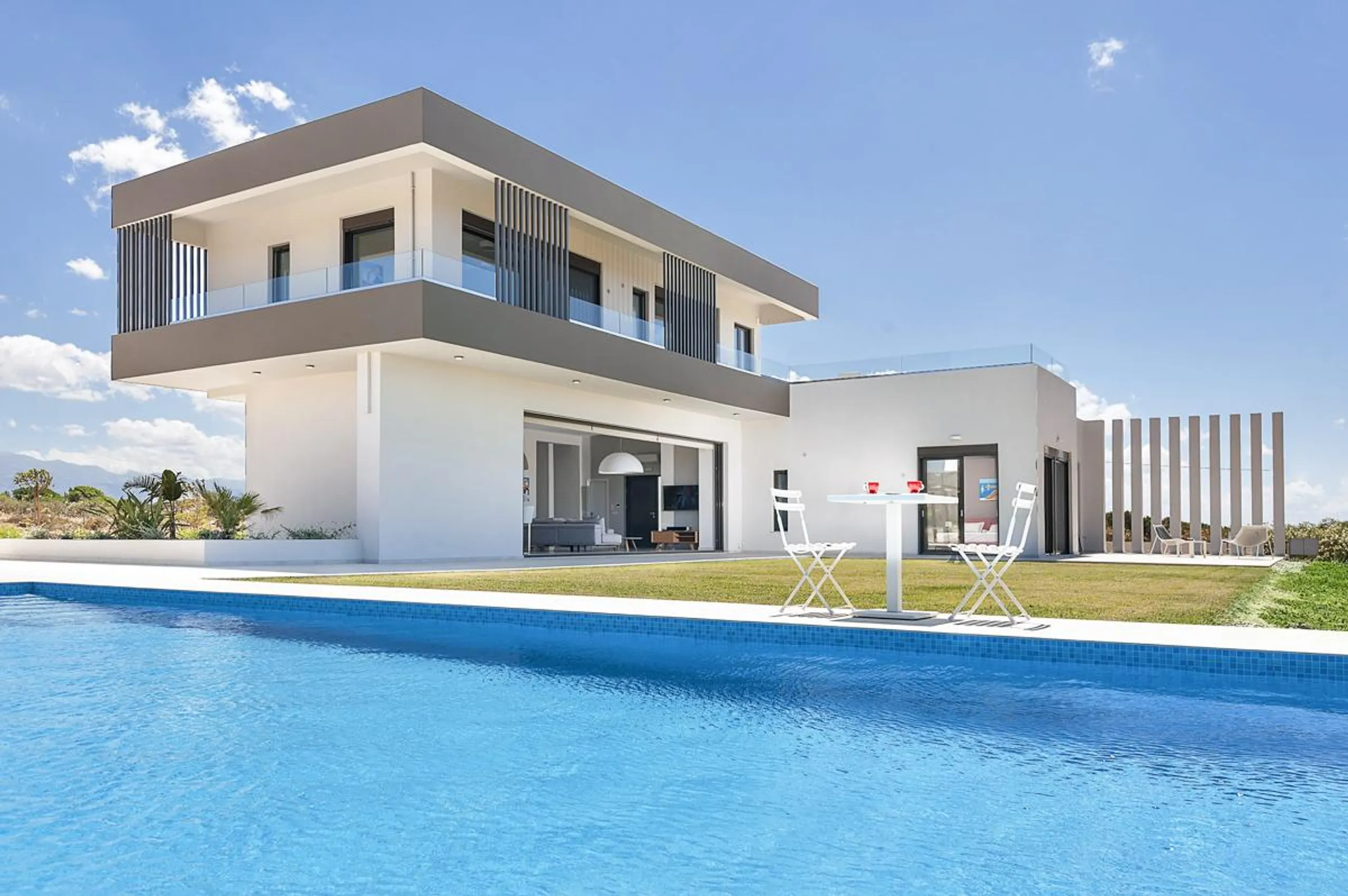 Chic Mediterranean Villa with Heated Infinity Pool, Tennis Court and Mountain Views, Crete