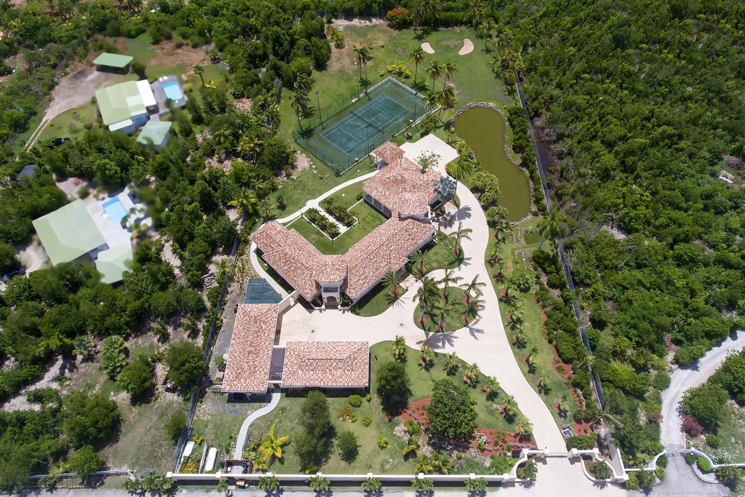 Luxury Redefined: Grand Luxe  Estate with Elegant Pool and Caribbean Views — photograph 4