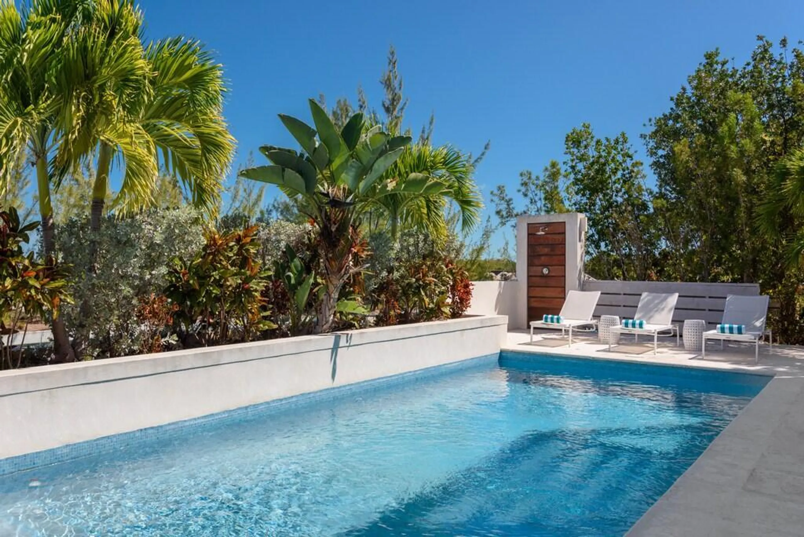 Side by Side Canal Front Dual Homes with Private Pools and Boat Dock — photograph 2